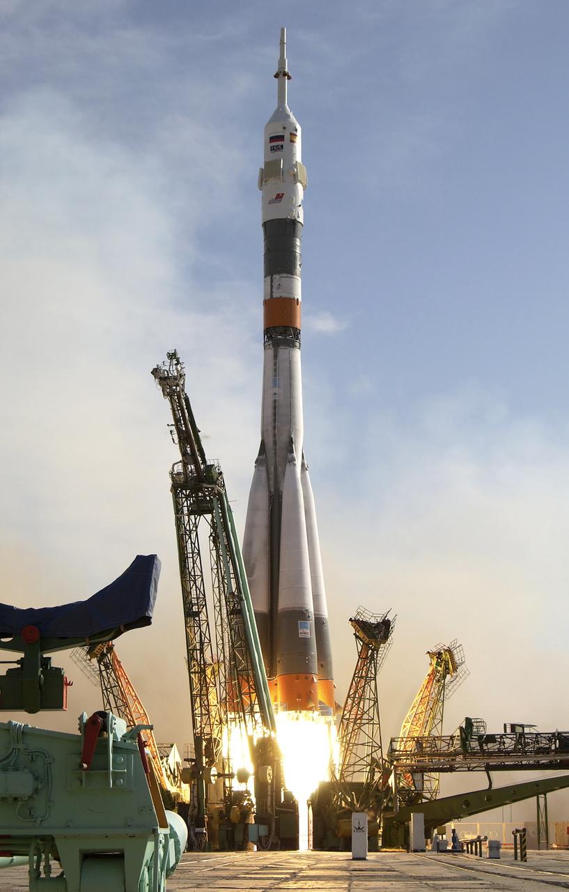 The Soyuz TMA-3 vehicle launches from the Baikonur Cosmodrome in Kazakhstan, Saturday, Oct. 18, 2003, carrying Expedition 8 Commander and NASA Science Officer Michael Foale, Expedition 8 Soyuz Commander Alexander Kaleri and European Space Agency astronaut Pedro Duque of Spain to the International Space Station. The trio will arrive at the ISS Oct. 20, as Foale and Kaleri take over command of Station operations for the next 6-1/2 months. Duque will return to Earth Oct. 28 with Expedition 7 Commander Yuri Malenchenko and NASA Science Officer Ed Lu in another Soyuz capsule already docked to the ISS. Photo Credit (NASA/Bill Ingalls)