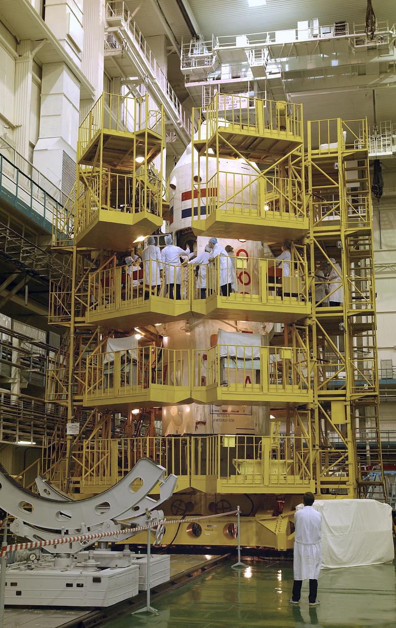 Expedition 9 Commander Gennady Padalka, Flight Engineer, NASA Science Officer Mike Fincke and European Space Agency astronaut Andre Kuipers of the Netherlands do their final fit check in the Soyuz capsule at building 254 at the Baikonur Cosmodrome in Kazakhstan, Wednesday, April 14, 2004. Photo Credit: (NASA/Bill Ingalls)