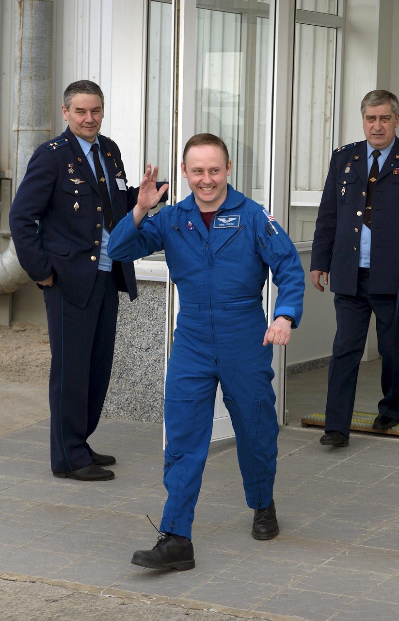 NASA Science Officer Mike Fincke departs building 254 at the Baikonur Cosmodrome in Kazakhstan after the final fit check in the Soyuz, Wednesday, April 14, 2004, in Baikonur, Kazakhstan.  Photo Credit: (NASA/Bill Ingalls)
