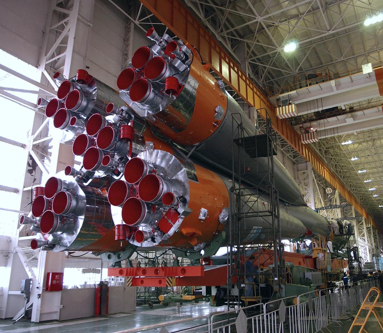 A view of the Soyuz rocket engines after engineers at the Baikonur Cosmodrome mated the Soyuz TMA-4 capsule with its booster rocket in preparation for a launch on April 19 of the Expedition 9 crew and a European astronaut to the International Space Station, Friday, April 16, 2004 in Baikonur, Kazakhstan. Photo Credit: (NASA/Bill Ingalls)