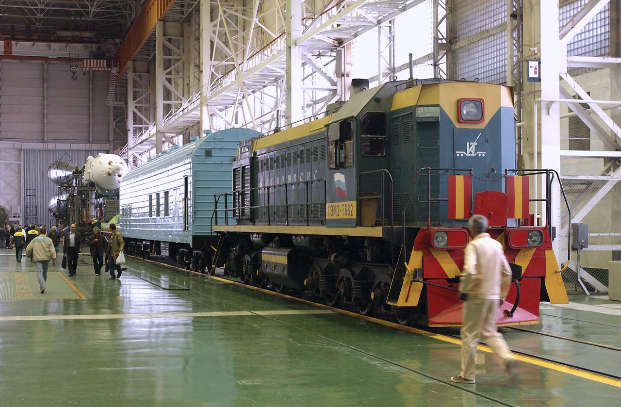Train engines are connected to the Soyuz rocket in preprapation for the rollout to the launch pad after engineers at the Baikonur Cosmodrome mated the Soyuz TMA-4 capsule with its booster rocket in preparation for a launch on April 19 of the Expedition 9 crew and a European astronaut to the International Space Station, Friday, April 16, 2004 in Baikonur, Kazakhstan. Photo Credit: (NASA/Bill Ingalls)