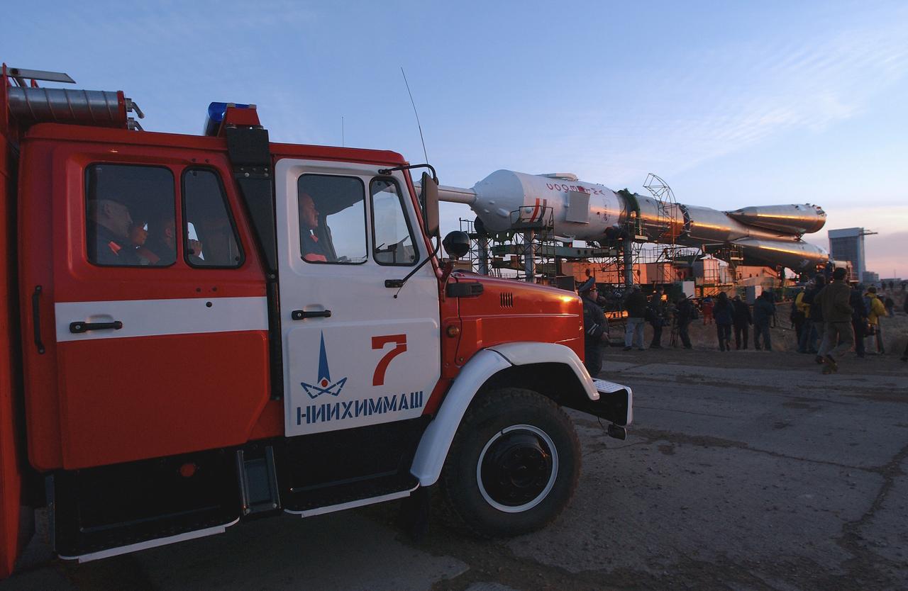 The Soyuz TMA-4 capsule and its booster rocket begin to roll to the launch pad at the Baikonur Cosmodrome on Saturday, April 17, 2004, in Baikonur, Kazakhstan in preparation for the launch of the Expedition 9 crew and a European researcher to the International Space Station on April 19. The Soyuz vehicle is transported to the launch pad horizontally on a railcar from its processing hangar in a process that takes about 2.5 hours to complete. Photo Credit: (NASA/Bill Ingalls)
