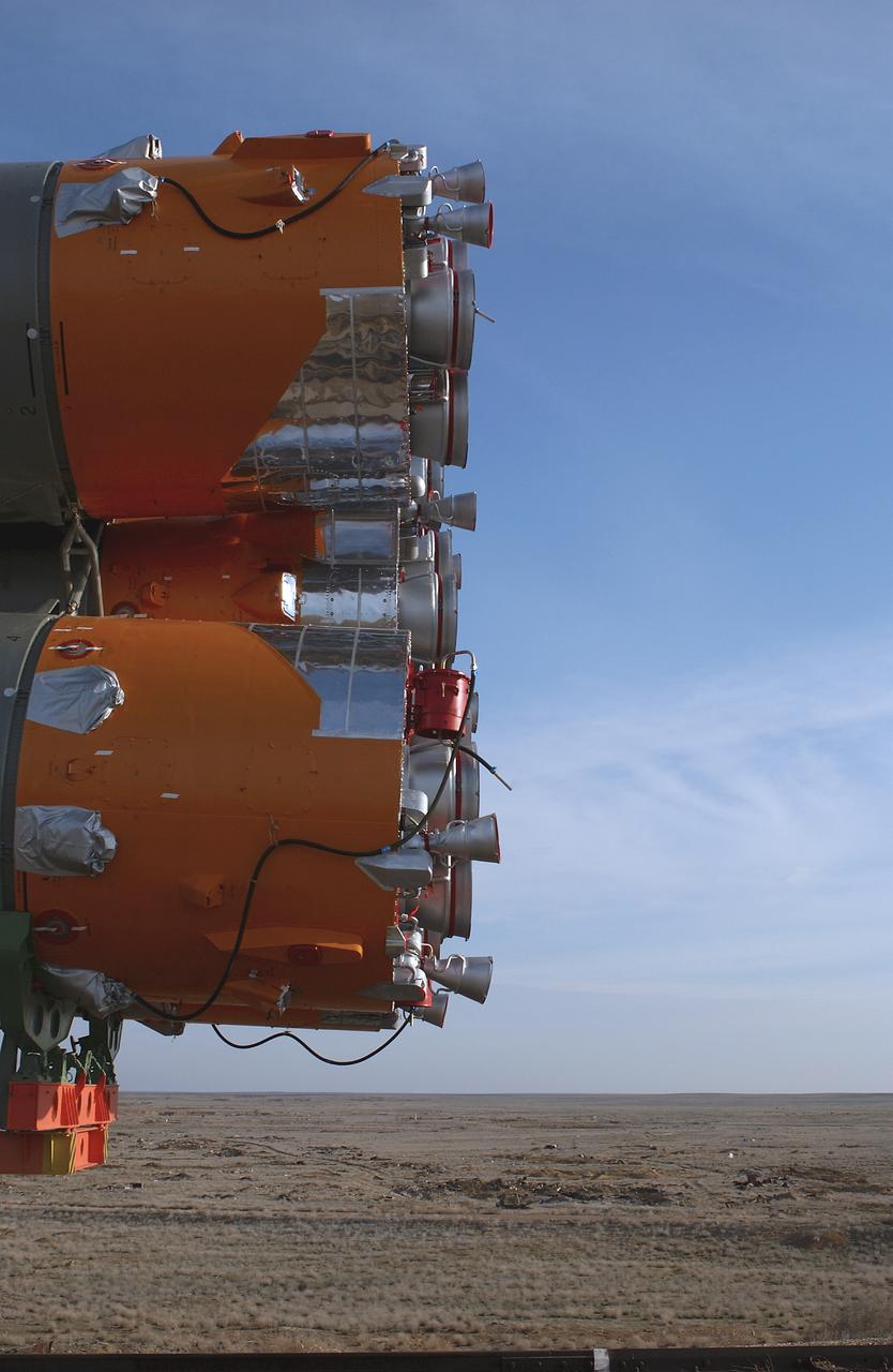 The Soyuz TMA-4 capsule and its booster rocket begin to roll to the launch pad at the Baikonur Cosmodrome on Saturday, April 17, 2004, in Baikonur, Kazakhstan in preparation for the launch of the Expedition 9 crew and a European researcher to the International Space Station on April 19. The Soyuz vehicle is transported to the launch pad horizontally on a railcar from its processing hangar in a process that takes about 2.5 hours to complete. Photo Credit: (NASA/Bill Ingalls)