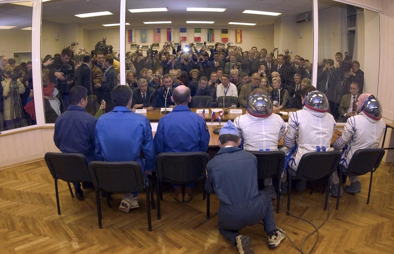 Seated from left to right, NASA Expedition 9 backup Commander Leroy Chiao, backup Flight Engineer Salizhan Sharipov, backup European Space Agency astronaut Gerhard Thiele of Germany, Flight Engineer and NASA Science Officer Mike Fincke, Expedition 9 Commander Gennady Padalka and European Space Agency astronaut Andre Kuipers of the Netherlands meet with launch authoritites, press and family one last time prior to departing for the launch pad where they were launched on board a Soyuz TMA-4 vehicle, Monday, April 19, 2004 to the International Space Station.  Photo Credit: (NASA/Bill Ingalls)