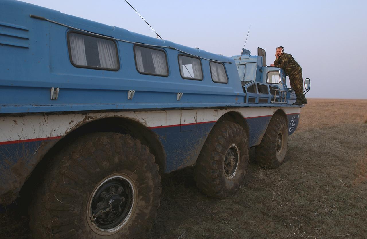 A Russian made all terrain vehicle waits to transport crew members from the inflatable medical tent to their helicopters, Friday, April 30, 2004, following the landing of Expedition 8 in north central Kazakhstan. Commander Michael Foale, Soyuz Flight Engineer Alexander Kaleri and European Space Agency astronaut Andre Kuipers, of the Netherlands landed in a Soyuz TMA-3 capsule. Foale and Kaleri completed 195 days in space aboard the International Space Station, while Kuipers returned after an 11-day research mission as part of a commercial agreement between ESA and the Russian Federal Space Agency. Photo Credit: (NASA/Bill Ingalls)