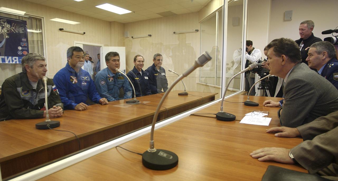 From Left to Right, Russian Space Forces cosmonaut Yuri Shargin, Expedition 10 Commander and NASA Science Officer Leroy Chiao, Flight Engineer and Soyuz Commander Salizhan Sharipov, backup Soyuz Commander Valery Tokarev and backup Expedition 10 Commander Bill McArthur report to space officials on the results of the dress rehearsal of their launch activities, Tuesday, October 5, 2004, at the Baikonur Cosmodrome in Kazakhstan. Chiao, Sharipov and Shargin are scheduled to launch October 14 on their Soyuz TMA-5 spacecraft to the International Space Station. Photo Credit: (NASA/Bill Ingalls)