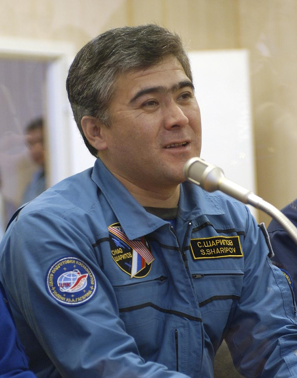 Expedition 10 Flight Engineer and Soyuz Commander Salizhan Sharipov reports to space officials on the results of the dress rehearsal of their launch activities Friday, October 5, 2004, at the Baikonur Cosmodrome in Kazakhstan.  Chiao, Sharipov and Shargin are scheduled to launch October 14 on their Soyuz TMA-5 spacecraft to the International Space Station.  Photo Credit: (NASA/Bill Ingalls)