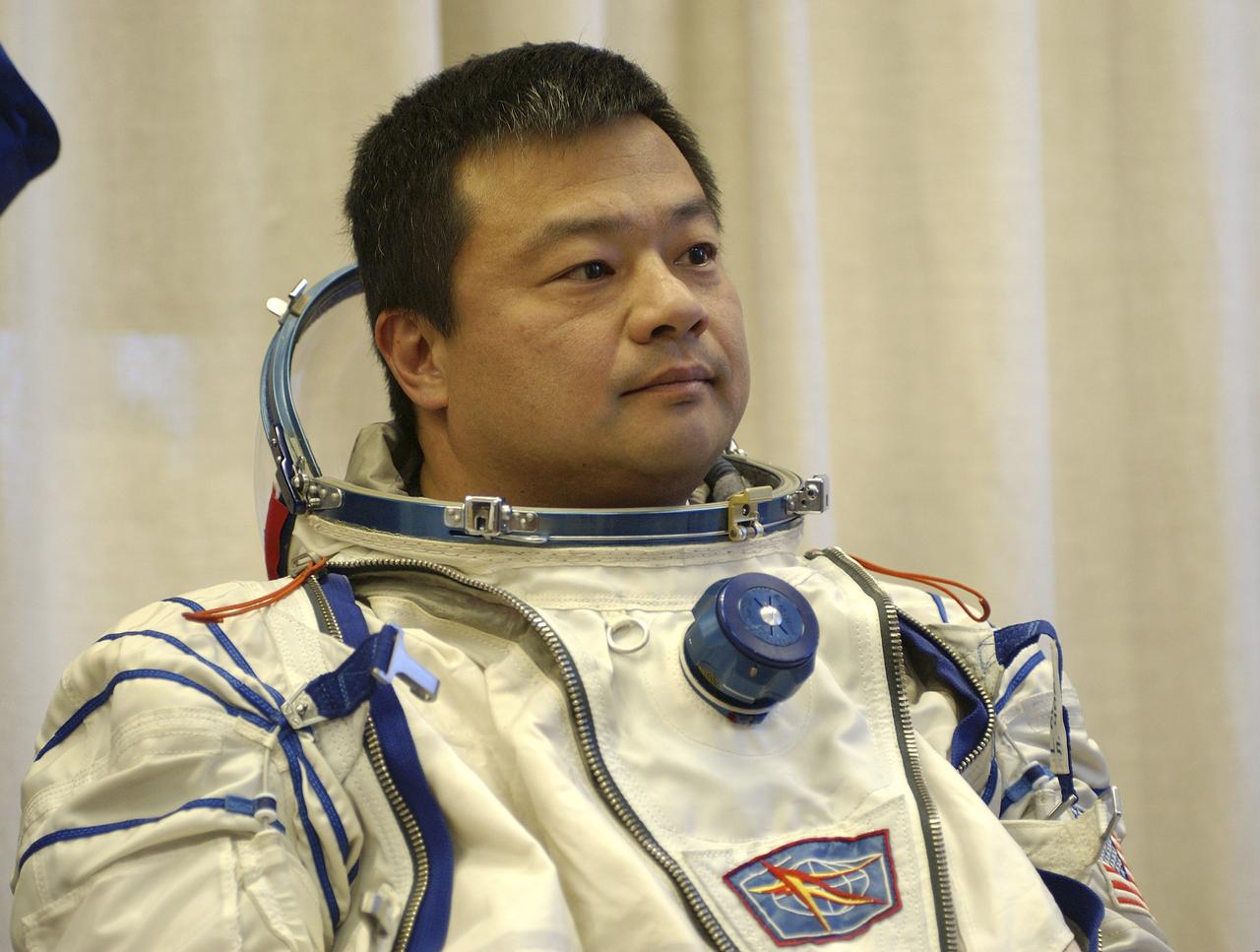 Expedition 10 Commander and NASA Science Officer Leroy Chiao donned his launch and entry suit and climbed aboard the Soyuz TMA-5 spacecraft Friday, October 5, 2004, at the Baikonur Cosmodrome in Kazakhstan for a dress rehearsal of launch day activities leading to their liftoff October 14 to the International Space Station.  Chiao and Sharipov, the first crew of all-Asian extraction, will spend six months on the Station.  Shargin will return to Earth October 24 with the Stations' current residents, Expedition 9 Commander Gennady Padalka and NASA Flight Engineer and Science Officer Mike Fincke.  Photo Credit: (NASA/Bill Ingalls)