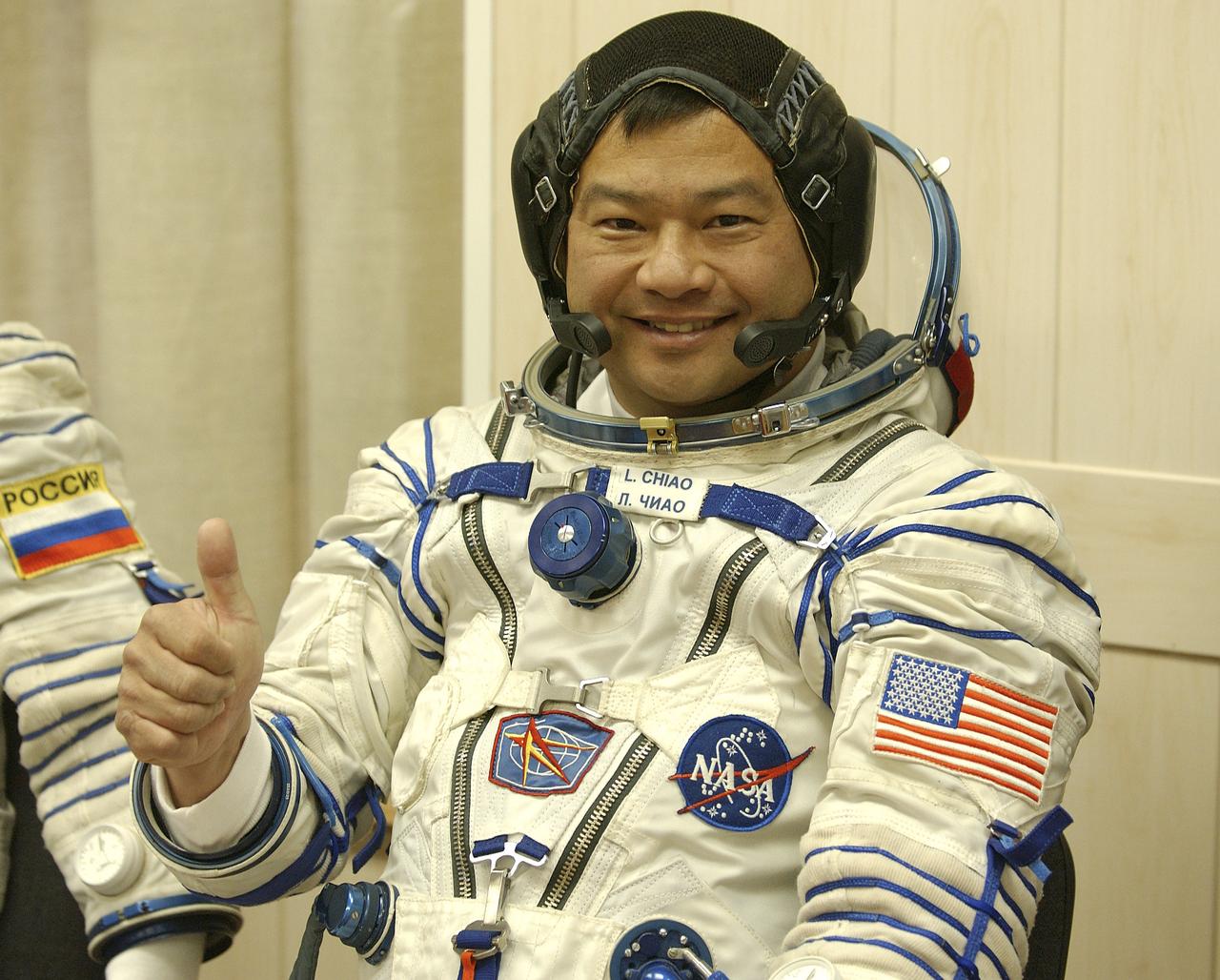Expedition 10 Commander and NASA Science Officer Leroy Chiao donned his launch and entry suit and climbed aboard the Soyuz TMA-5 spacecraft Friday, October 5, 2004, at the Baikonur Cosmodrome in Kazakhstan for a dress rehearsal of launch day activities leading to their liftoff October 14 to the International Space Station.  Chiao and Sharipov, the first crew of all-Asian extraction, will spend six months on the Station.  Shargin will return to Earth October 24 with the Stations' current residents, Expedition 9 Commander Gennady Padalka and NASA Flight Engineer and Science Officer Mike Fincke.  Photo Credit: (NASA/Bill Ingalls) 