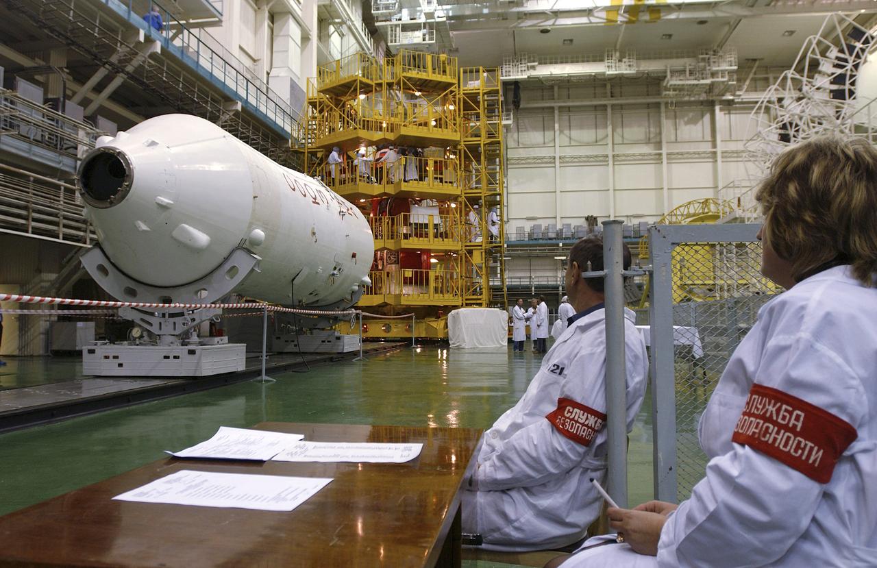 Security controls access to the Soyuz capsule and test stand area, Friday, Oct. 5, 2004, at the Baikonur Cosmodrome. Expedition 10 Commander and NASA Science Officer Leroy Chiao, Flight Engineer and Soyuz Commander Salizhan Sharipov and Russian Space Forces Cosmonaut Yuri Shargin donned their launch and entry suits and climbed aboard their Soyuz TMA-5 for a dress rehearsal of launch day activities leading to their liftoff October 14 to the International Space Station. Chiao and Sharipov, the first crew of all-Asian extraction, will spend six months on the Station. Shargin will return to Earth October 24 with the Stations' current residents, Expedition 9 Commander Gennady Padalka and NASA Flight Engineer and Science Officer Mike Fincke. Photo Credit: (NASA/Bill Ingalls)