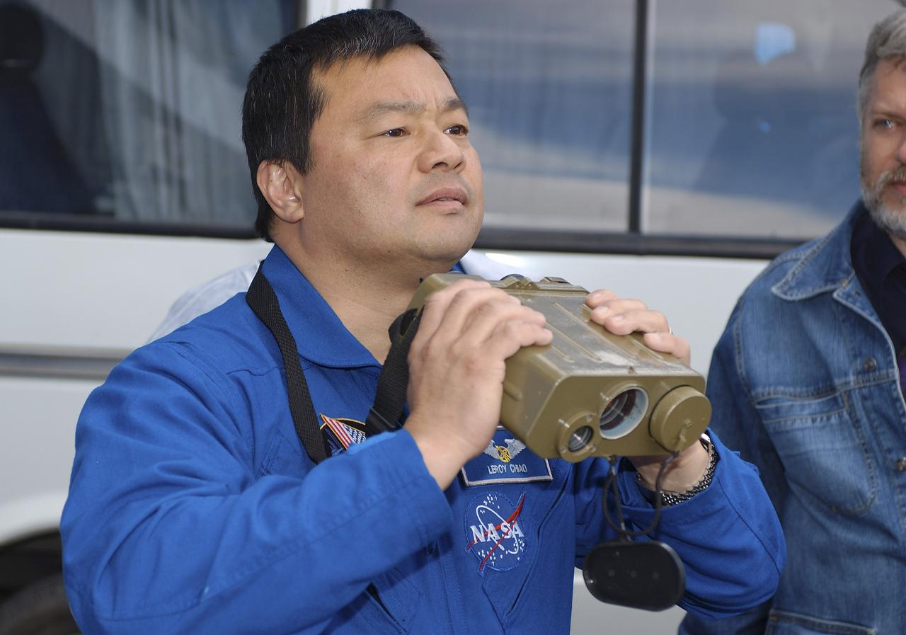 Expedition 10 Commander and NASA Science Officer Leroy Chiao practices using a range finder during a dress rehearsal of launch day activities, Friday, Oct. 5, 2004, in Baikonur, Kazakhstan.  Expedition 10 is scheduled to launch October 14 to the International Space Station.  Photo Credit: (NASA/Bill Ingalls)