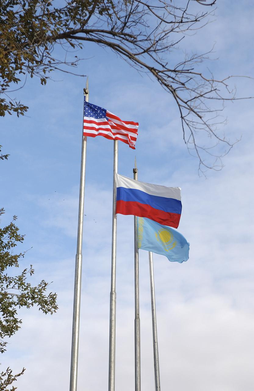 The flags of the United States of America, the Russian Federation and Kazakhstan are seen after the ceremonial flag raising ceremony. Expedition 10 Flight Engineer and Soyuz Commander Salizhan Sharipov, Commander and NASA Science Officer Leroy Chiao, Russian Space Forces cosmonaut Yuri Shargin, backup Soyuz Commander Valery Tokarev and backup Expedition Commander Bill McArthur patricipated in the ceremonial flag raising at the Cosmonaut Hotel, Baikonur, Kazakhstan, Wednesday, Oct. 6, 2004. Chiao, Sharipov and Shargin are scheduled to launch October 14 on their Soyuz TMA-5 spacecraft to the International Space Station. Photo Credit: (NASA/Bill Ingalls)