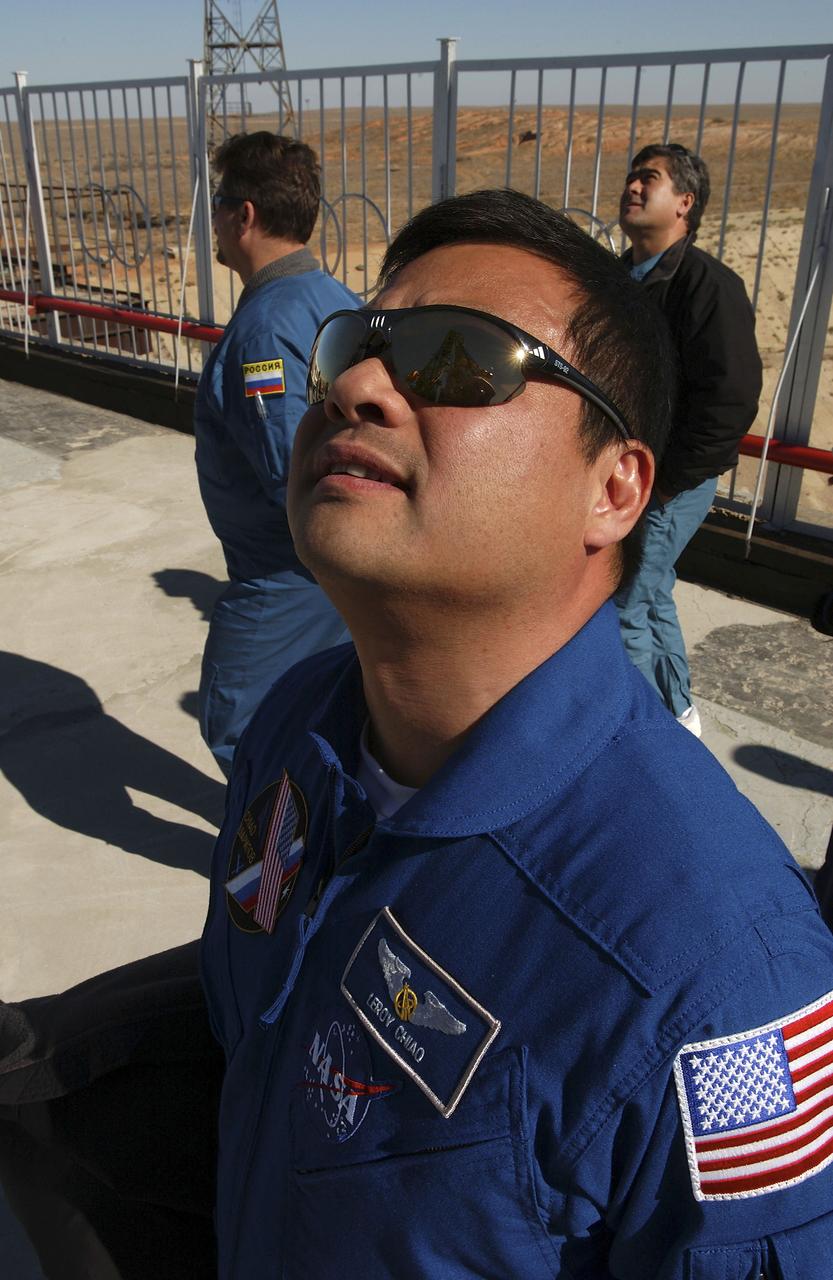 Expedition 10 Commander and NASA Science Officer Leroy Chiao, foreground, and Flight Engineer and Soyuz Commander Salizhan Sharipov, tour their launch pad on Saturday, October 9, 2004, at the Baikonur Cosmodrome in Kazakhstan prior to their liftoff to the International Space Station October 14.  Their Soyuz rocket will roll out to the pad on October 12.  Photo Credit: (NASA/Bill Ingalls)