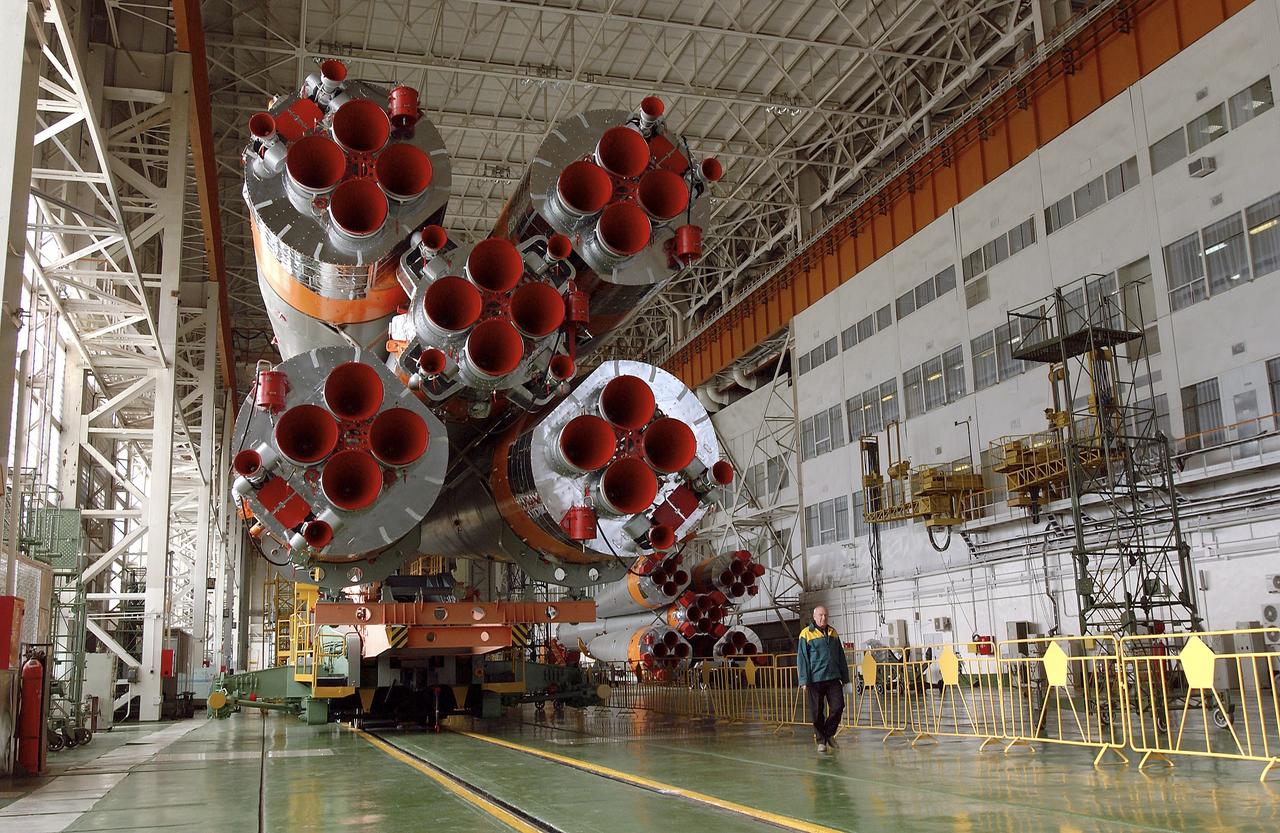The Soyuz TMA-5 spacecraft is mated to its booster rocket in a processing hangar at the Baikonur Cosmodrome in Kazakhstan Monday, October 11, 2004, in preparation for its rollout to the launch pad October 12 and its liftoff October 14 to carry Expedition 10 Commander and NASA Science Officer Leroy Chiao, Flight Engineer and Soyuz Commander Salizhan Sharipov and Russian Space Forces cosmonaut Yuri Shargin to the International Space Station.  Photo Credit: (NASA/Bill Ingalls)