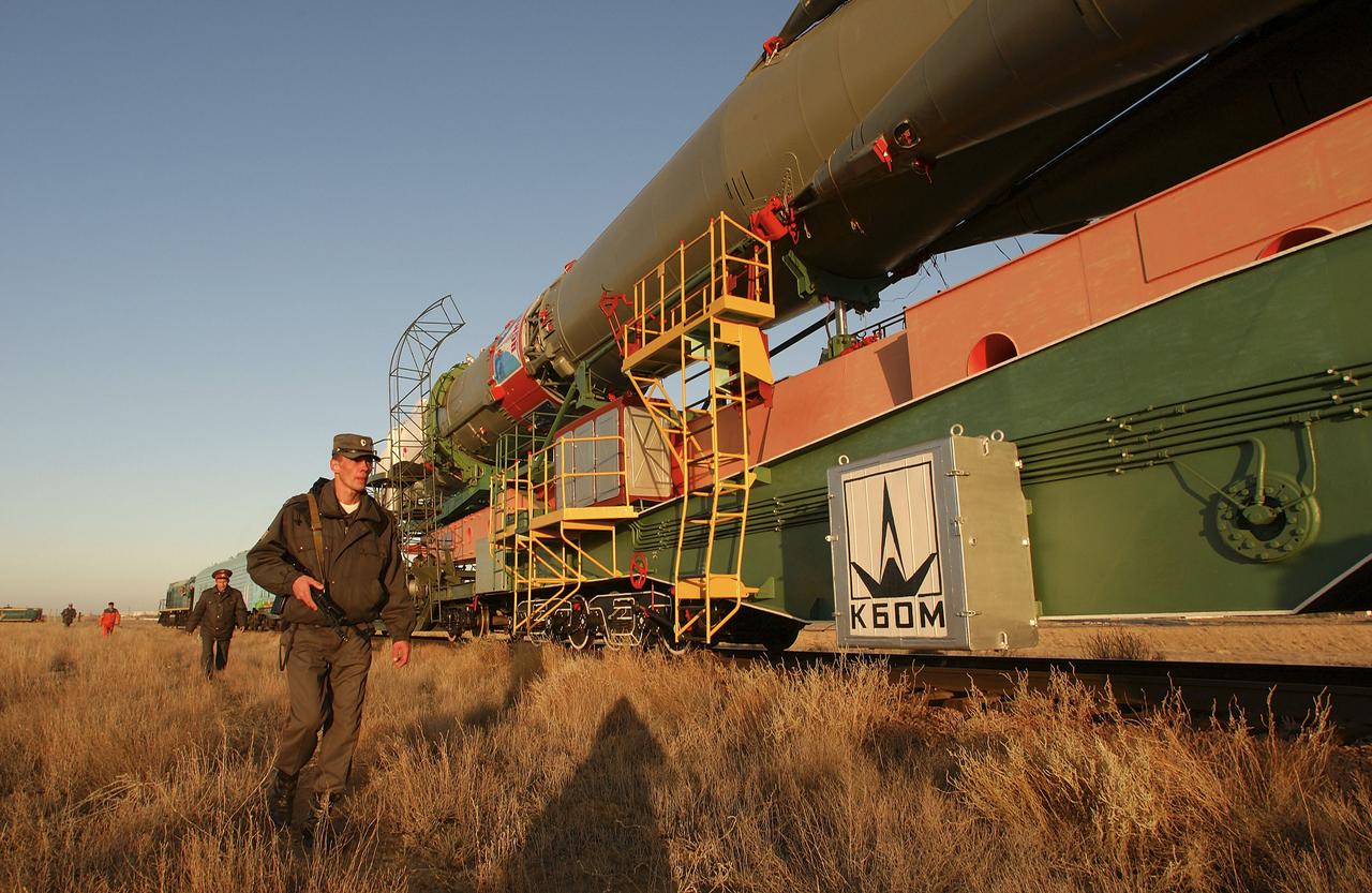 The Soyuz TMA-5 vehicle rolled to its launch pad at the Baikonur Cosmodrome in Kazakhstan, Tuesday, October 12, 2004, in preparation for its launch October 14 to send Expedition 10 Commander and NASA Science Officer Leroy Chiao, Flight Engineer and Soyuz Commander Salizhan Sharipov and Russian Space Forces cosmonaut Yuri Shargin to the International Space Station.  Chiao and Sharipov will replace the Expedition 9 crew of Gennady Padalka and Mike Fincke, while Shargin will conduct eight days of scientific experiments.  He will return to earth with the Expedition 9 crew October 24.  Photo Credit: (NASA/Bill Ingalls)