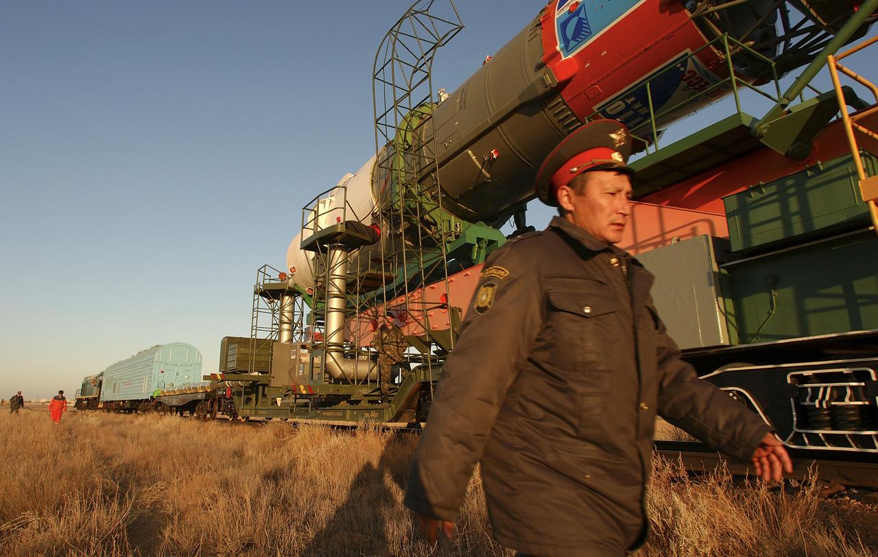 The Soyuz TMA-5 vehicle rolled to its launch pad at the Baikonur Cosmodrome in Kazakhstan, Tuesday, October 12, 2004, in preparation for its launch October 14 to send Expedition 10 Commander and NASA Science Officer Leroy Chiao, Flight Engineer and Soyuz Commander Salizhan Sharipov and Russian Space Forces cosmonaut Yuri Shargin to the International Space Station.  Chiao and Sharipov will replace the Expedition 9 crew of Gennady Padalka and Mike Fincke, while Shargin will conduct eight days of scientific experiments.  He will return to earth with the Expedition 9 crew October 24.  Photo Credit: (NASA/Bill Ingalls)