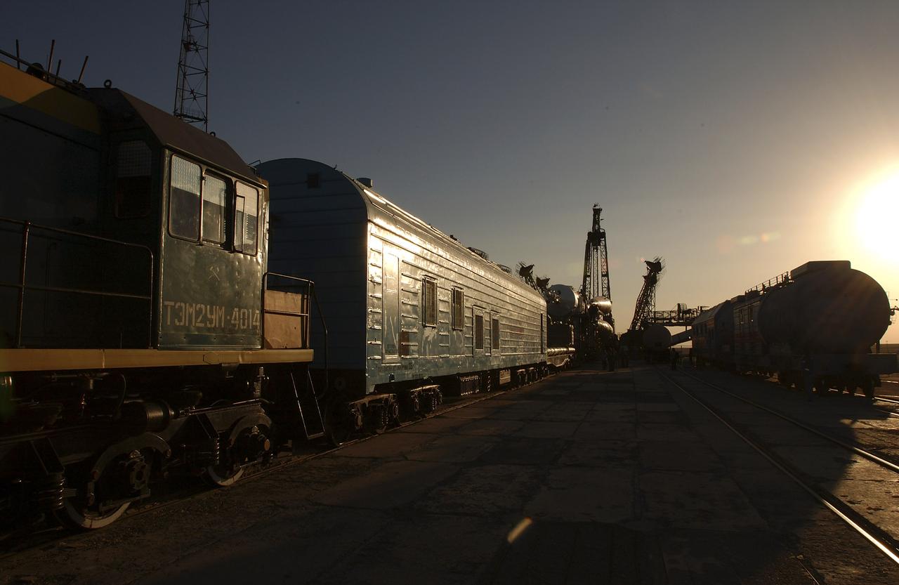The Soyuz TMA-5 vehicle rolled to its launch pad at the Baikonur Cosmodrome in Kazakhstan, Tuesday, October 12, 2004, in preparation for its launch October 14 to send Expedition 10 Commander and NASA Science Officer Leroy Chiao, Flight Engineer and Soyuz Commander Salizhan Sharipov and Russian Space Forces cosmonaut Yuri Shargin to the International Space Station. Chiao and Sharipov will replace the Expedition 9 crew of Gennady Padalka and Mike Fincke, while Shargin will conduct eight days of scientific experiments. He will return to earth with the Expedition 9 crew October 24. Photo Credit: (NASA/Bill Ingalls)