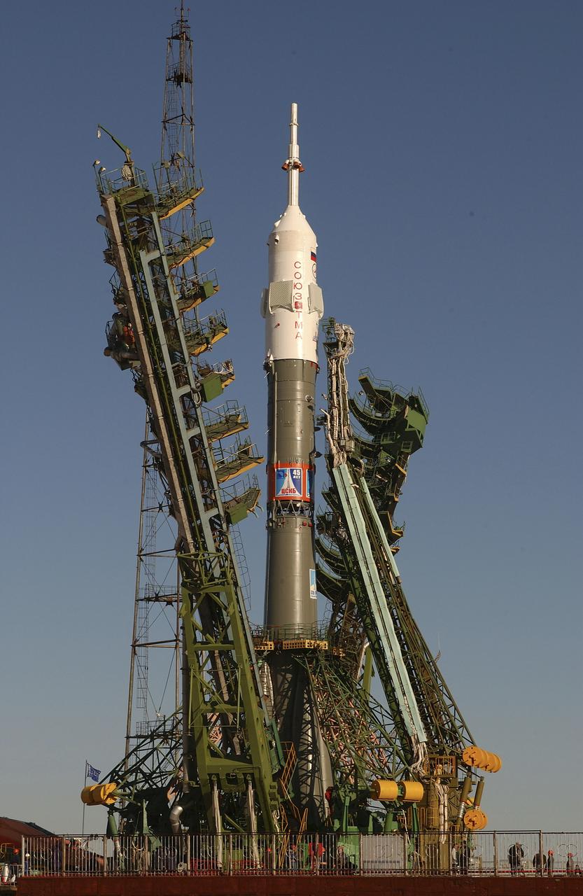 The Soyuz TMA-5 vehicle rolled to its launch pad at the Baikonur Cosmodrome in Kazakhstan, Tuesday, October 12, 2004, in preparation for its launch October 14 to send Expedition 10 Commander and NASA Science Officer Leroy Chiao, Flight Engineer and Soyuz Commander Salizhan Sharipov and Russian Space Forces cosmonaut Yuri Shargin to the International Space Station. Chiao and Sharipov will replace the Expedition 9 crew of Gennady Padalka and Mike Fincke, while Shargin will conduct eight days of scientific experiments. He will return to earth with the Expedition 9 crew October 24. Photo Credit: (NASA/Bill Ingalls)