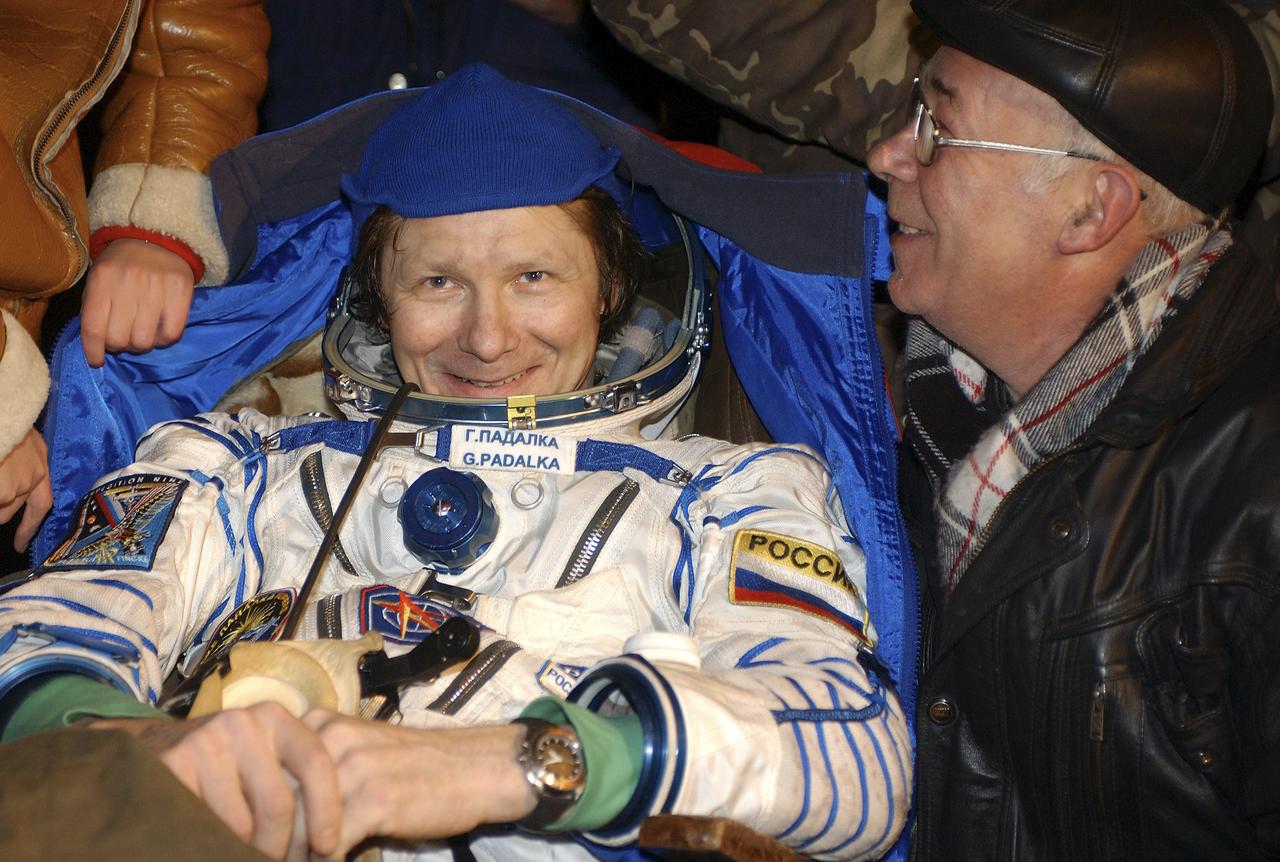 Expedition 9 Commander Gennady Padalka smiles after the successful landing in the Soyuz spacecraft with fellow crew members Expedition 9 Flight Engineer Michael Fincke and Russian Space Forces cosmonaut Yuri Shargin. The crew landed in their Soyuz capsule approximately 85 kilometers northeast of Arkalyk in northern Kazakhstan, Sunday, October 24, 2004.  Photo Credit: (NASA/Bill Ingalls)