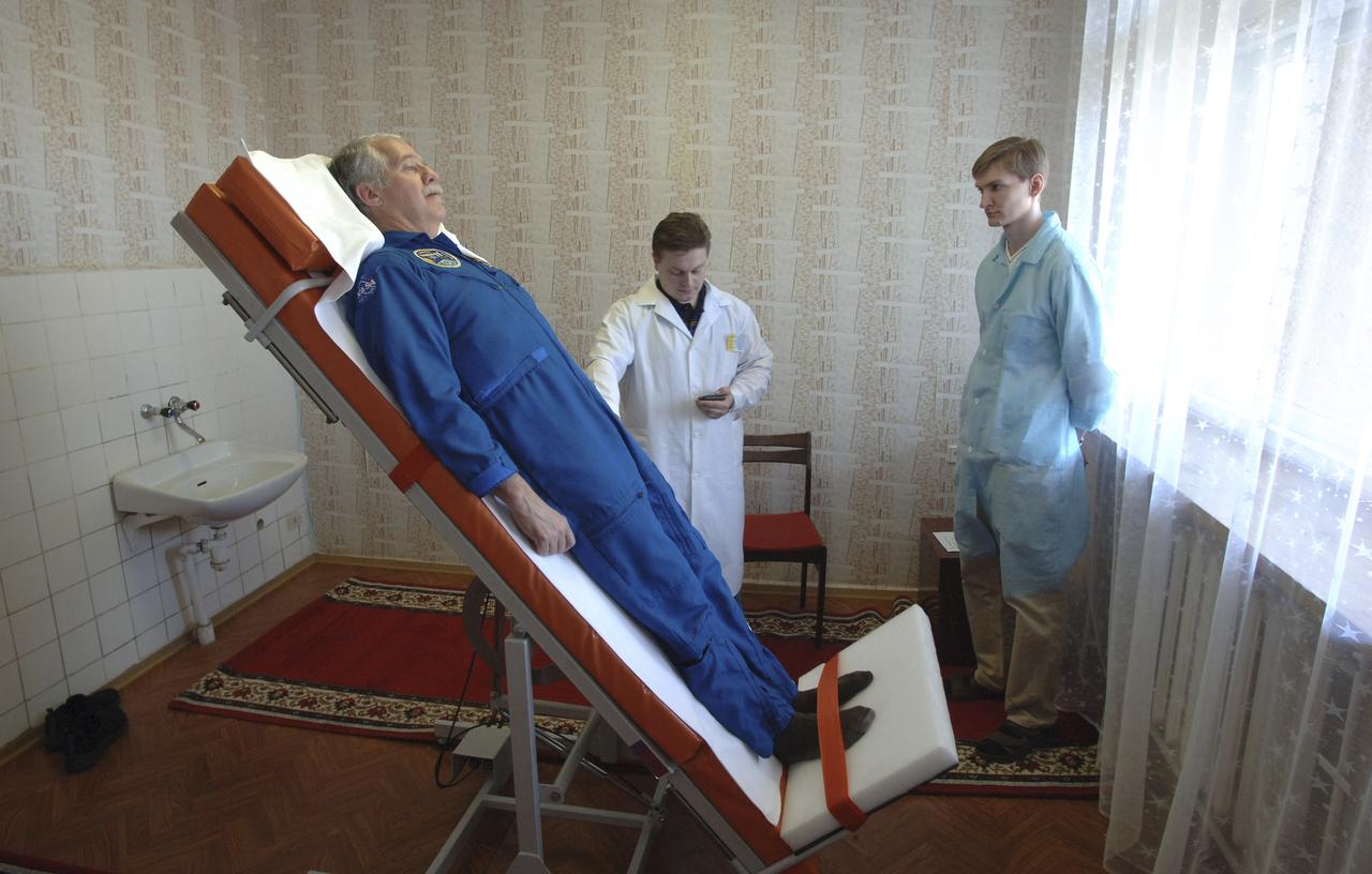 Expedition 11 Flight Engineer John Phillips takes part in a tilt table test, Monday, April 11, 2005, in Baikonur, Kazakhstan as technicians collect pre-launch data on the state of his equilibrium prior to the April 15 launch to the International Space Station. Photo Credit: (NASA/Bill Ingalls)