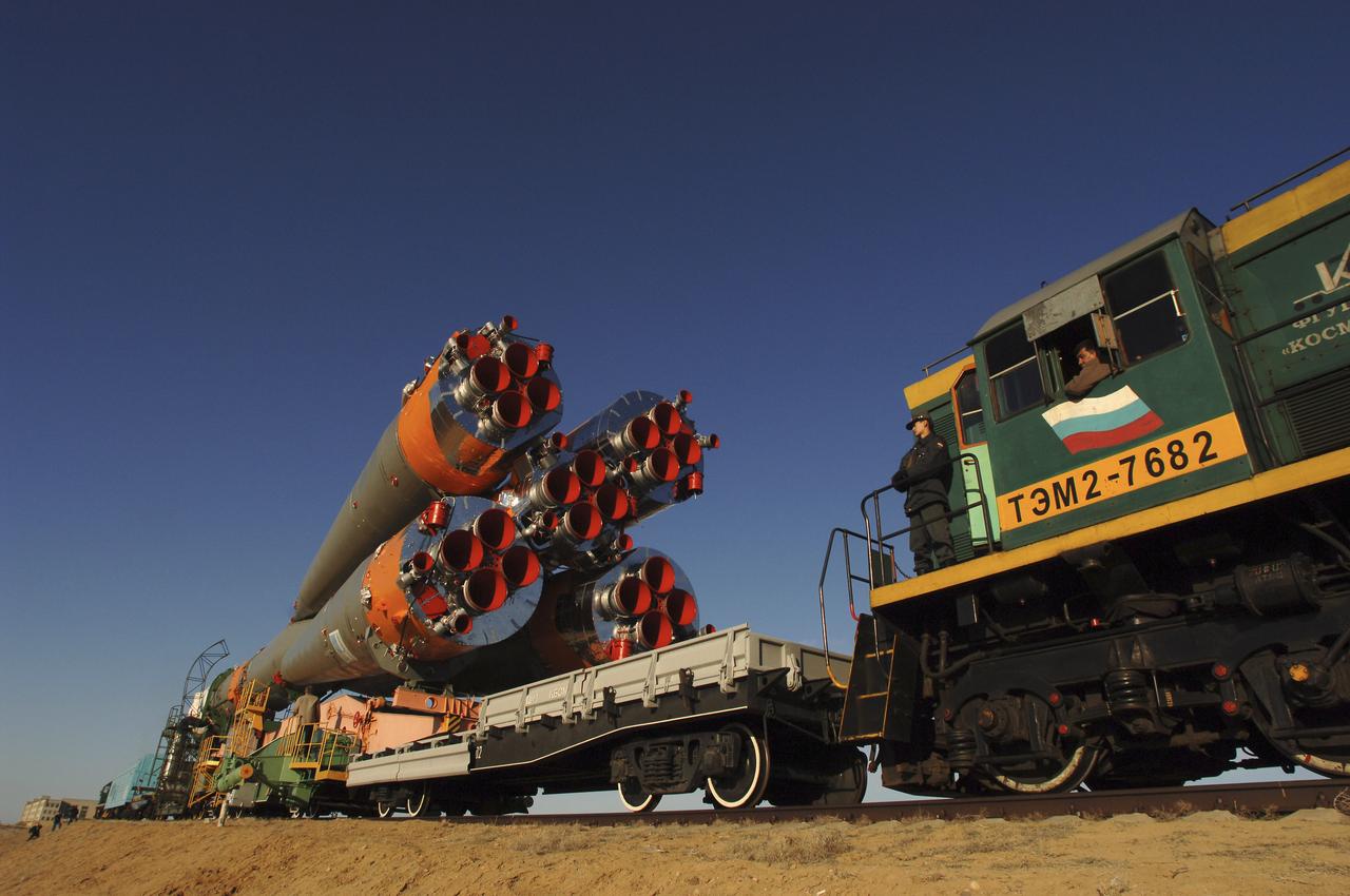 The Soyuz TMA-6 vehicle is transported by train to the launch pad at the Baikonur Cosmodrome in Kazakhstan, Wednesday, April 13, 2005, as preparations continued for the April 15 launch to send Expedition 11 Commander Sergei Krikalev, Flight Engineer John Phillips and European Space Agency Astronaut Roberto Vittori, of Italy, to the International Space Station. Krikalev and Phillips will spend six months in space and greet the first Shuttle crew to fly in more than two years when it arrives at the station, while Vittori spends eight days on the station under a commercial contract between ESA and the Russian Federal Space Agency. Photo Credit: (NASA/Bill Ingalls)