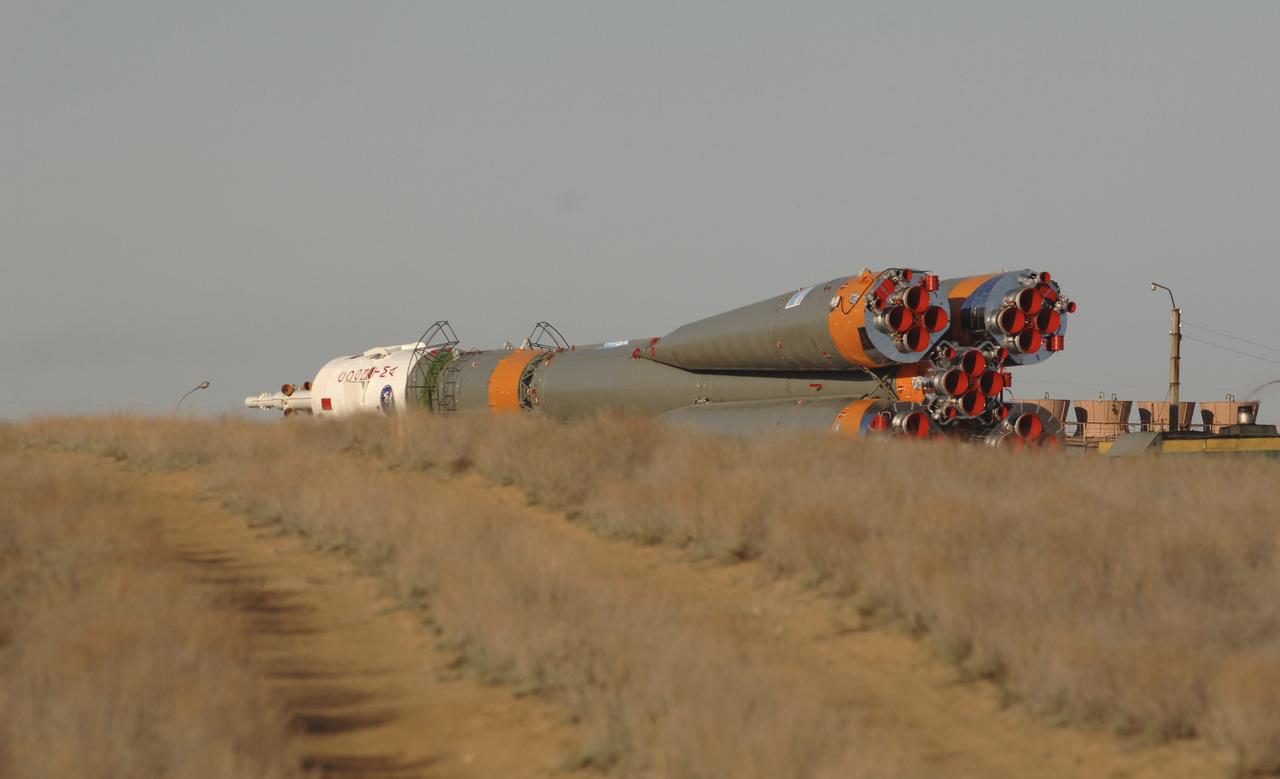 The Soyuz TMA-6 vehicle is transported by train to the launch pad at the Baikonur Cosmodrome in Kazakhstan, Wednesday, April 13, 2005, as preparations continued for the April 15 launch to send Expedition 11 Commander Sergei Krikalev, Flight Engineer John Phillips and European Space Agency Astronaut Roberto Vittori, of Italy, to the International Space Station. Krikalev and Phillips will spend six months in space and greet the first Shuttle crew to fly in more than two years when it arrives at the station, while Vittori spends eight days on the station under a commercial contract between ESA and the Russian Federal Space Agency. Photo Credit: (NASA/Bill Ingalls)