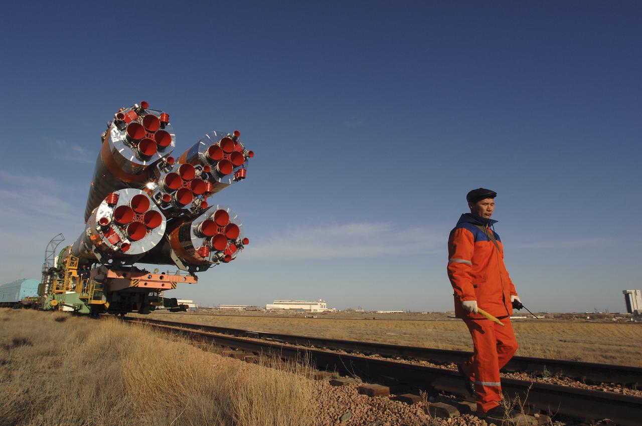 The Soyuz TMA-6 vehicle is transported by train to the launch pad at the Baikonur Cosmodrome in Kazakhstan, Wednesday, April 13, 2005, as preparations continued for the April 15 launch to send Expedition 11 Commander Sergei Krikalev, Flight Engineer John Phillips and European Space Agency Astronaut Roberto Vittori, of Italy, to the International Space Station. Krikalev and Phillips will spend six months in space and greet the first Shuttle crew to fly in more than two years when it arrives at the station, while Vittori spends eight days on the station under a commercial contract between ESA and the Russian Federal Space Agency. Photo Credit: (NASA/Bill Ingalls)