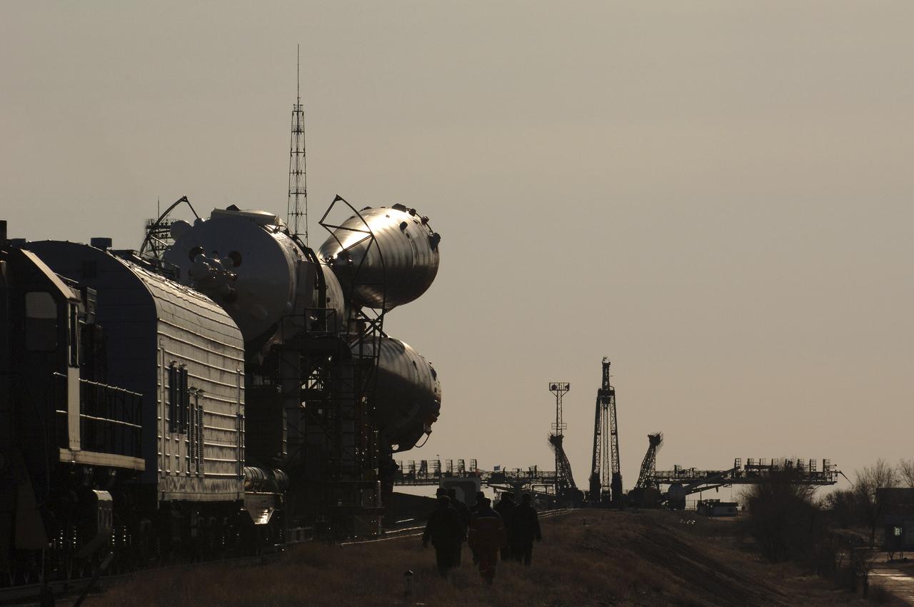 The Soyuz TMA-6 vehicle is transported by train to the launch pad at the Baikonur Cosmodrome in Kazakhstan, Wednesday, April 13, 2005, as preparations continued for the April 15 launch to send Expedition 11 Commander Sergei Krikalev, Flight Engineer John Phillips and European Space Agency Astronaut Roberto Vittori, of Italy, to the International Space Station. Krikalev and Phillips will spend six months in space and greet the first Shuttle crew to fly in more than two years when it arrives at the station, while Vittori spends eight days on the station under a commercial contract between ESA and the Russian Federal Space Agency. Photo Credit: (NASA/Bill Ingalls)
