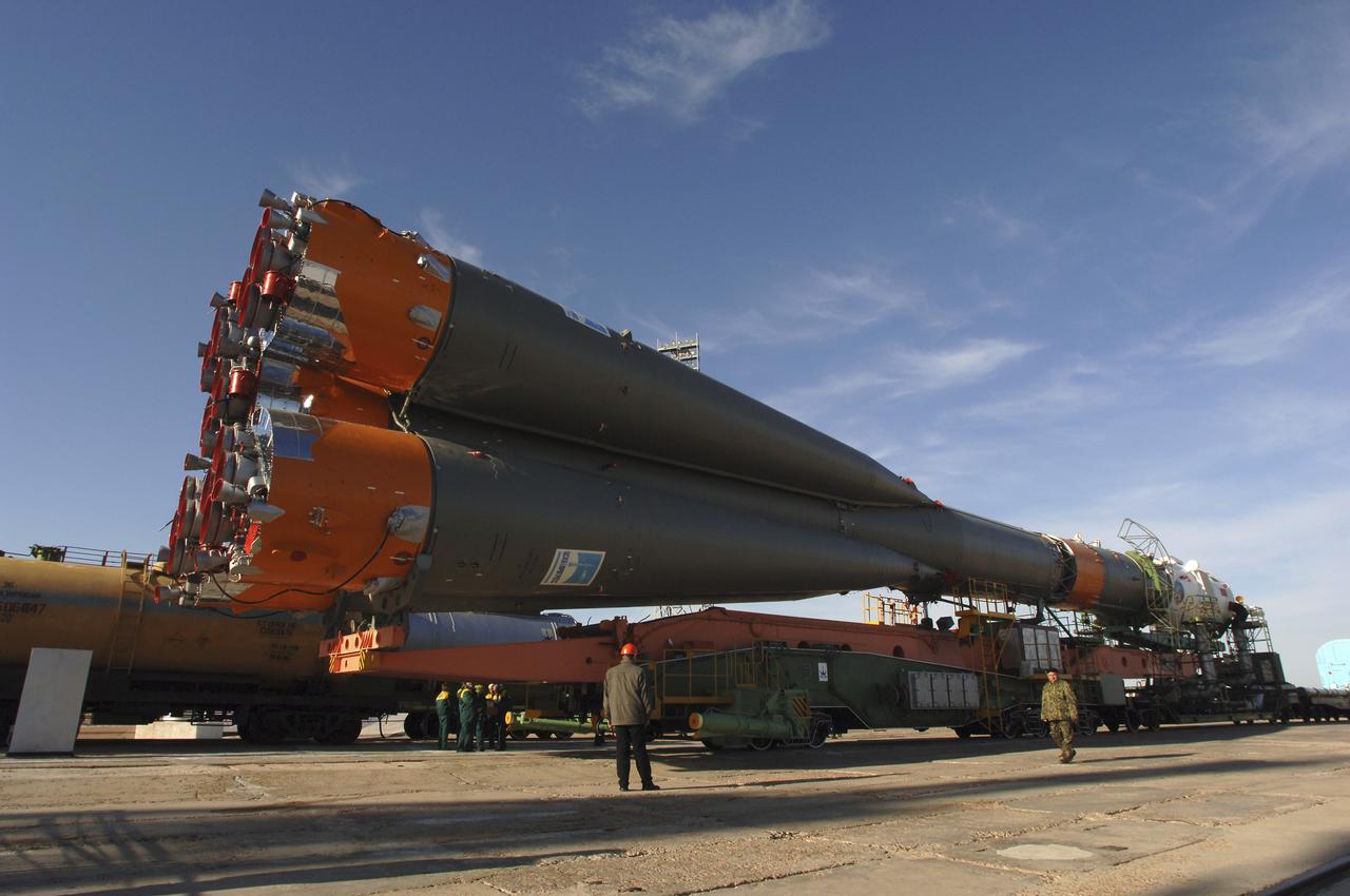 The Soyuz TMA-6 vehicle is transported by train to the launch pad at the Baikonur Cosmodrome in Kazakhstan, Wednesday, April 13, 2005, as preparations continued for the April 15 launch to send Expedition 11 Commander Sergei Krikalev, Flight Engineer John Phillips and European Space Agency Astronaut Roberto Vittori, of Italy, to the International Space Station. Krikalev and Phillips will spend six months in space and greet the first Shuttle crew to fly in more than two years when it arrives at the station, while Vittori spends eight days on the station under a commercial contract between ESA and the Russian Federal Space Agency. Photo Credit: (NASA/Bill Ingalls)