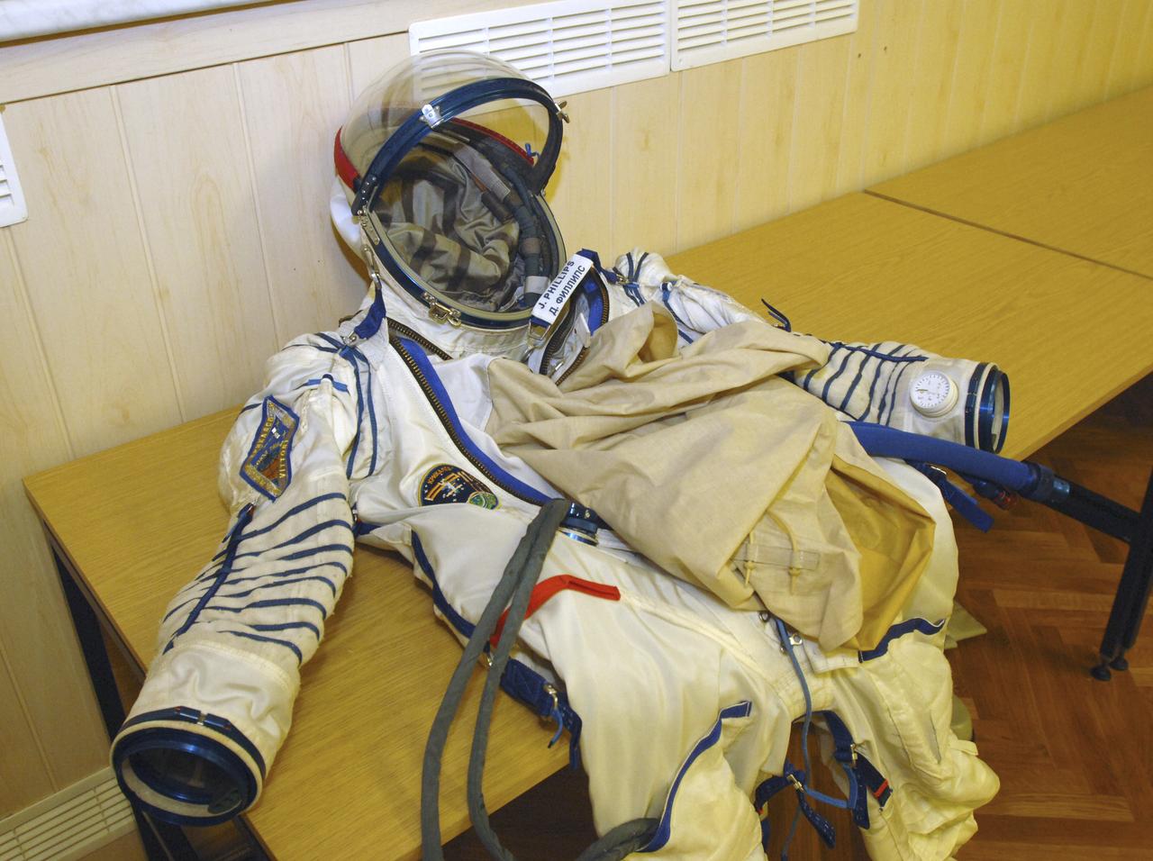 The Russian Sokol suit to be worn by Flight Engineer and NASA Science Officer John Phillips is seen Friday, April 15, 2005, at the Baikonur Cosmodrome in Baikonur, Kazakhstan prior to launch. Phillips, along with Commander Sergei Krikalev and European Space Agency Astronaut Roberto Vittori, of Italy, were preparing for launch aboard the Soyuz TMA-6 spacecraft for a two-day trip to the International Space Station. Photo Credit: (NASA/Bill Ingalls)