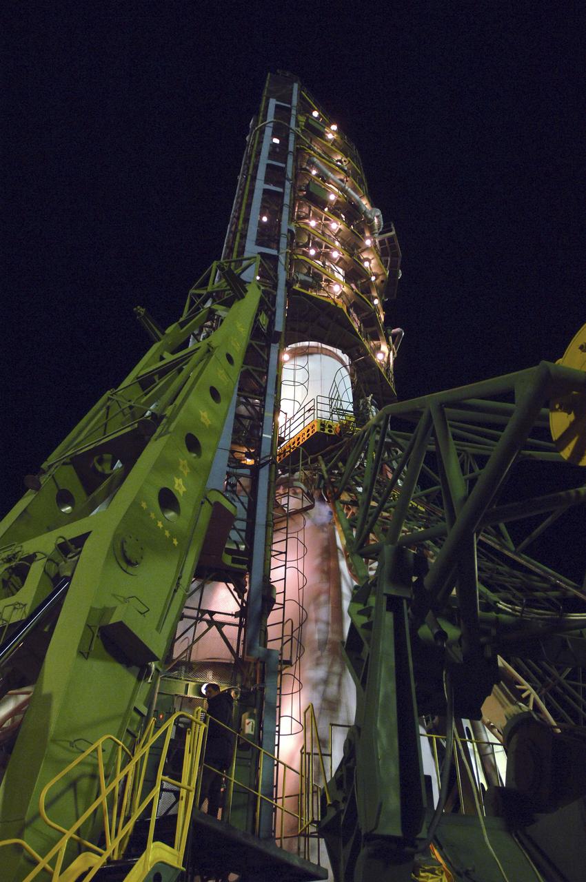 Expedition 11 Commander Sergei Krikalev, Flight Engineer and NASA Science Officer John Phillips and European Space Agency astronaut Roberto Vittori of Italy ride the elevator to the top of the Soyuz TMA-6 rocket, Friday, April 15, 2005 at the Baikonur Cosmodrome in Kazakhstan. Photo Credit: (NASA/Bill Ingalls)