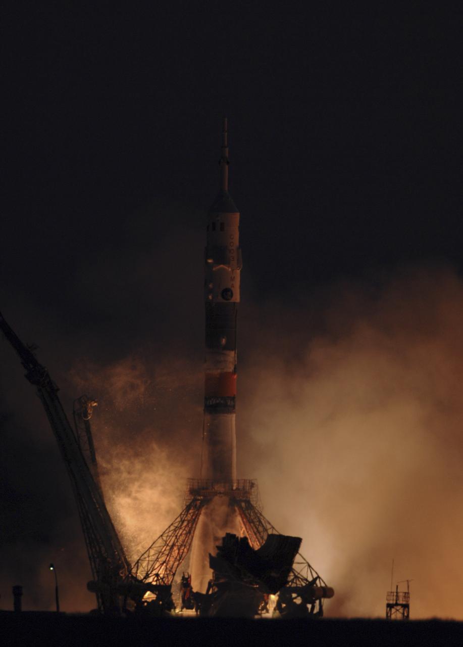 Expedition 11 Commander Sergei Krikalev, Flight Engineer and NASA Science Officer John Phillips and European Space Agency astronaut Roberto Vittori, of Italy, blast off aboard the Soyuz TMA-6 spacecraft from the Baikonur Cosmodrome in Kazakhstan, Friday, April 15, 2005, for a two-day trip to the International Space Station. Krikalev and Phillips will spend six months on the Station, replacing Expedition 10 Commander Leroy Chiao and Flight Engineer Salizhan Sharipov, while Vittori will spend eight days on the Station under a commerical contract between ESA and the Russian Federal Space Agency, returning to Earth with Chiao and Sharipov on April 25. Photo Credit: (NASA/Bill Ingalls)