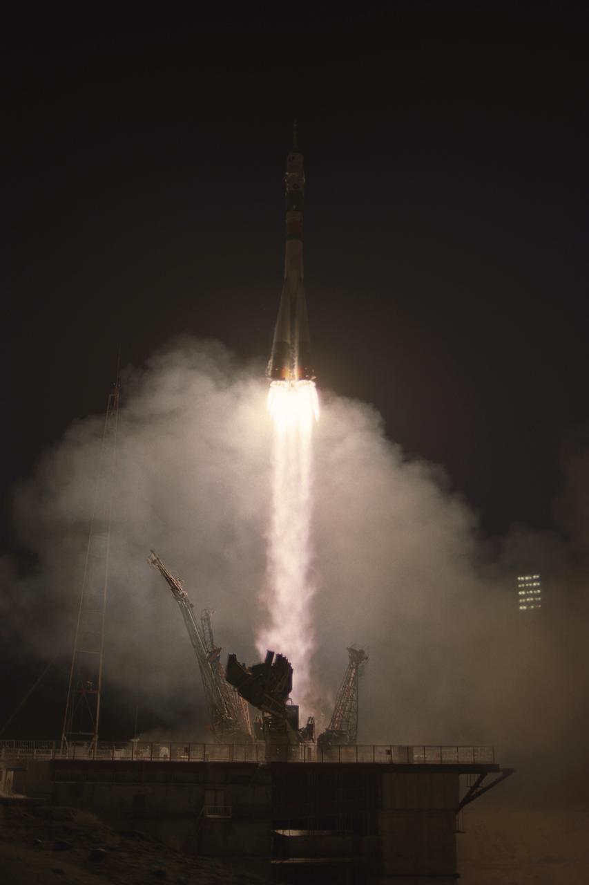 Expedition 11 Commander Sergei Krikalev, Flight Engineer and NASA Science Officer John Phillips and European Space Agency astronaut Roberto Vittori, of Italy, blast off aboard the Soyuz TMA-6 spacecraft from the Baikonur Cosmodrome in Kazakhstan, Friday, April 15, 2005 for a two-day trip to the International Space Station. Photo Credit: (NASA/Bill Ingalls)