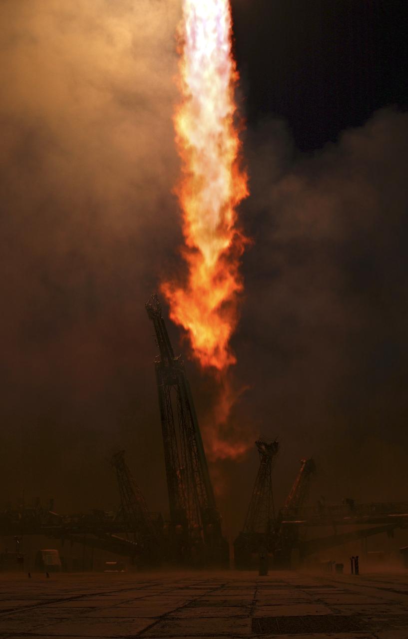 Expedition 11 Commander Sergei Krikalev, Flight Engineer and NASA Science Officer John Phillips and European Space Agency astronaut Roberto Vittori of Italy blast off aboard the Soyuz TMA-6 spacecraft from the Baikonur Cosmodrome in Kazakhstan, Friday, April 15, 2005, for a two-day trip to the International Space Station. Krikalev and Phillips will spend six months on the Station, replacing Expedition 10 Commander Leroy Chiao and Flight Engineer Salizhan Sharipov, while Vittori will spend eight days on the Station under a commerical contract between ESA and the Russian Federal Space Agency, returning to Earth with Chiao and Sharipov on April 25. Photo Credit: (NASA/Bill Ingalls)