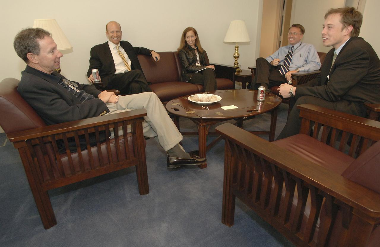 NASA Administrator Michael Griffin, left, meets with CEO of SpaceX Elon Musk, right, Wednesday, April 20, 2005 at NASA Headquarters in Washington. Looking on in the background are Larry Williams, NASA astronaut Marsha Ivins and NASA manager Christopher Shank. Photo Credit: (NASA/Renee Bouchard)