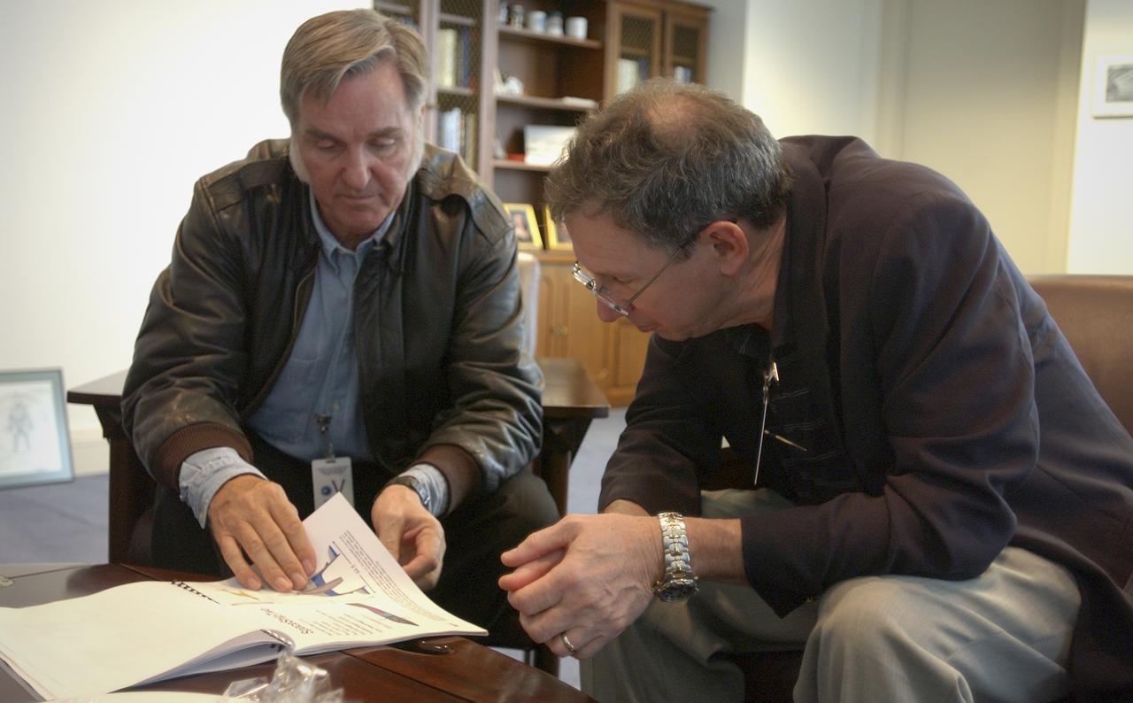 NASA Administrator Michael Griffin, right, meets with aerospace engineer Burt Rutan Wednesday, April 20, 2005 at NASA Headquarters in Washington. Photo Credit: (NASA/Renee Bouchard)