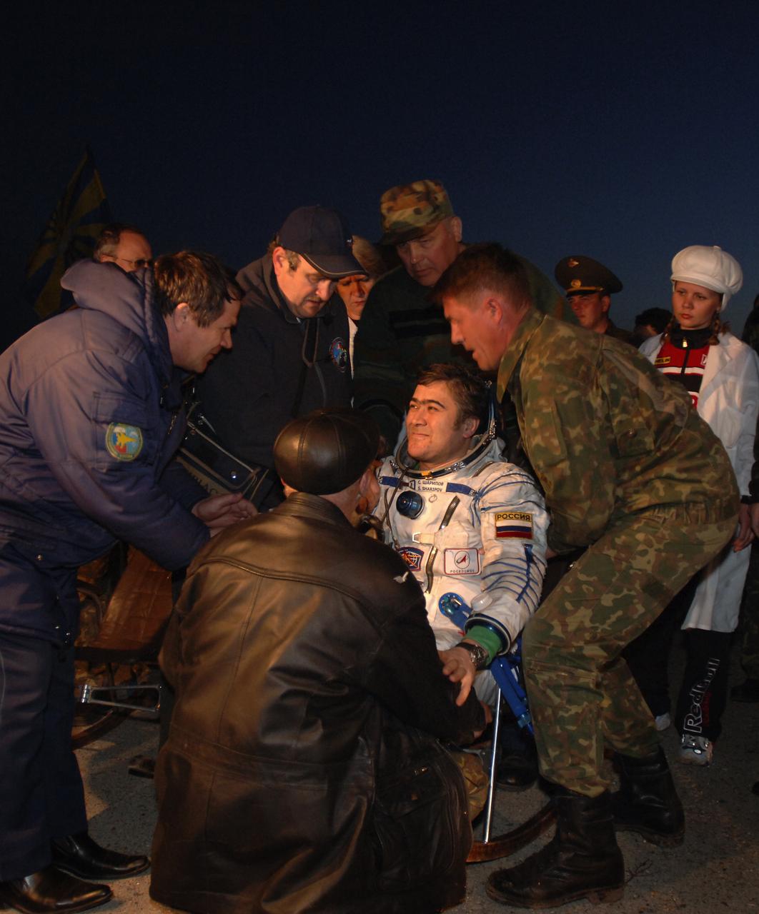 Expedition 10 Flight Engineer and Soyuz Commander Salizhan Sharipov sits in a chair after being pulled out of the Soyuz TMA-5 capsule, which landed northeast of the town of Arkalyk, Kazakhstan on Monday, April 25, 2005. Photo Credit: (NASA/Bill Ingalls)