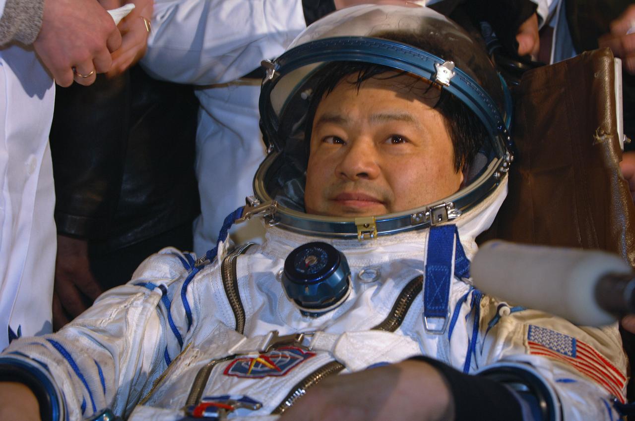 Expedition 10 Commander Leroy Chiao takes questions from the press after a pre-dawn landing in the Soyuz TMA-5 capsule Monday, April 25, 2005 northeast of the town of Arkalyk, Kazakhstan.  Chiao and Expedition 10 Flight Engineer Salizhan Sharipov wrapped up a six-month mission aboard the International Space Station, while European Space Agency astronaut Roberto Vittori completed a ten-day mission aboard the ISS under a commercial contract between ESA and the Russian Federal Space Agency.  Photo Credit: (NASA/Bill Ingalls)