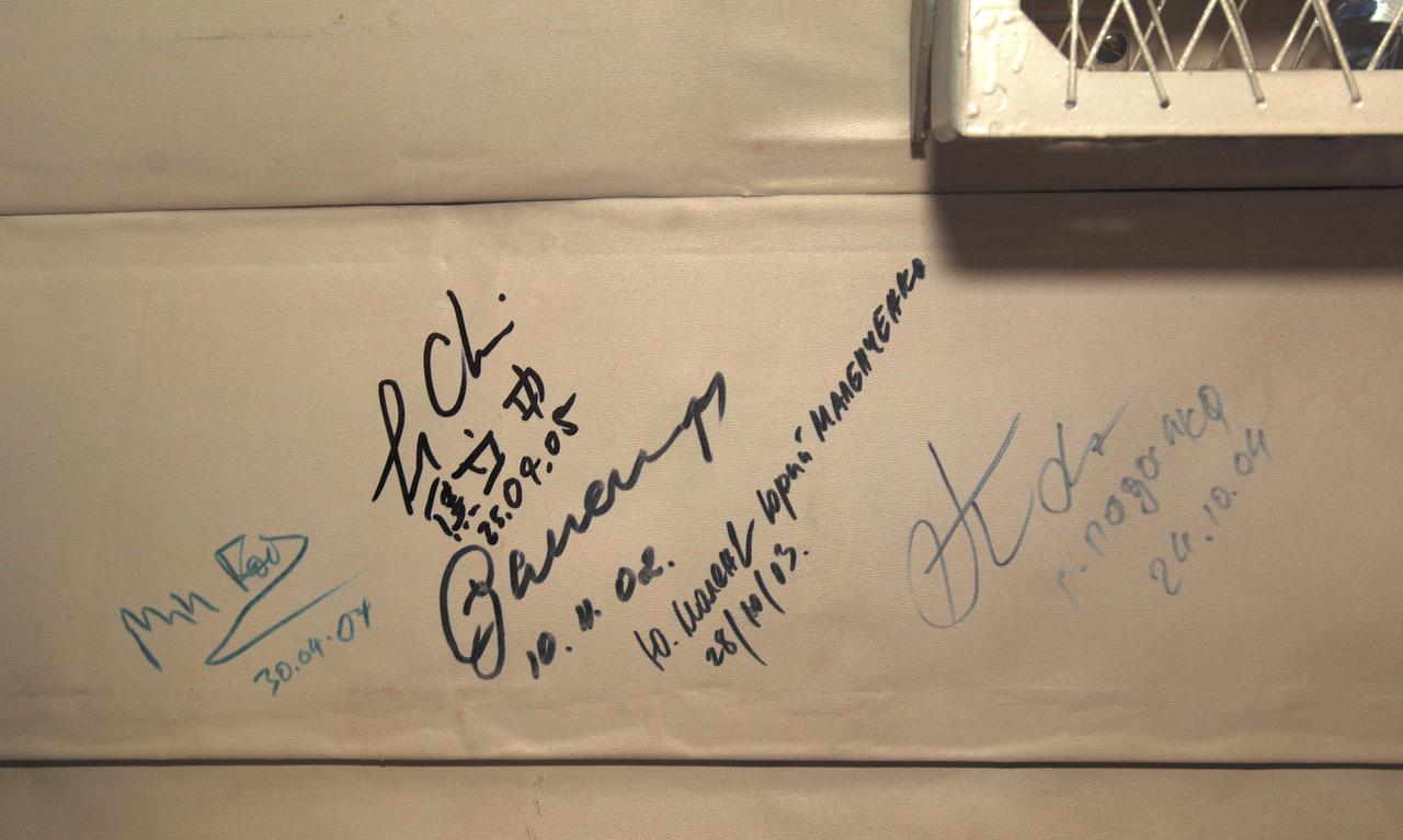 Signatures of astronauts and cosmonauts that have flown onboard this Russian helicopter are seen in this image, Monday, April 25, 2005, Kazakhstan.  Expedition 10 Commander Leroy Chiao, Flight Engineer Salizhan Sharipov and European Space Agency astronaut Roberto Vittori brought their Soyuz TMA-5 capsule to a pre-dawn landing April 25 northeast of the town of Arkalyk to wrap up a six-month mission aboard the International Space Station for Chiao and Sharipov, and a ten-day mission for Vittori, who flew under a commercial contract between ESA and the Russian Federal Space Agency.  Photo Credit: (NASA/Bill Ingalls)