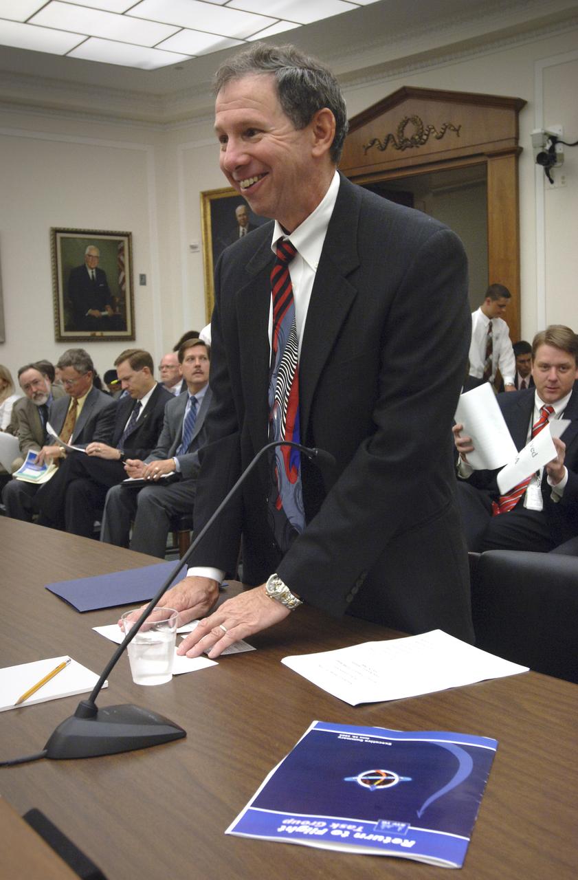 NASA Administrator Michael Griffin prepares to testify at a hearing before the House Science Committee, Tuesday,  June 28, 2005, Rayburn House Office building, Washington.  Photo Credit: (NASA/Bill Ingalls)