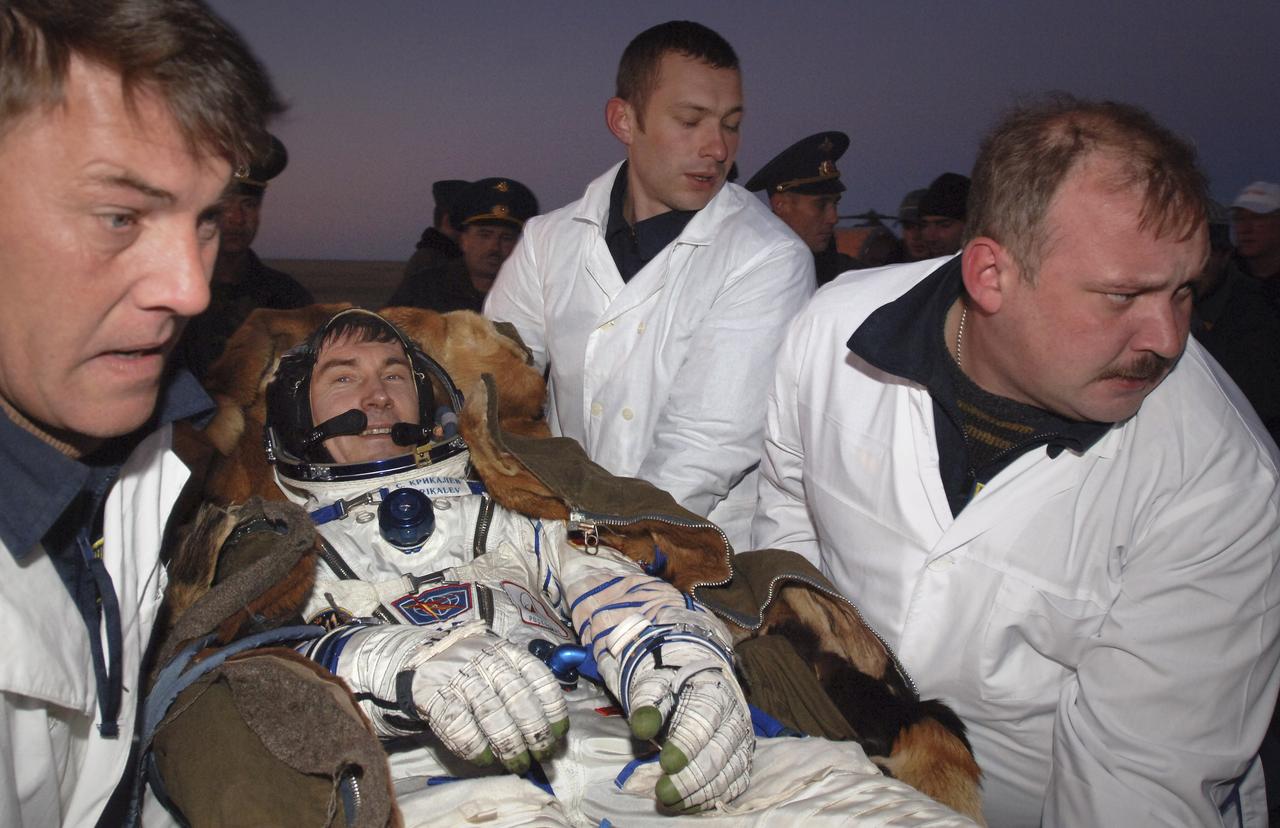 Expedition 11 cosmonaut Sergei Krikalev smiles after landing, Tuesday, Oct. 11, 2005, near Arlalyk, Kazakhstan. Krikalev and NASA astronaut John Phillips landed after a six-month mission in orbit. Along with American businessman Greg Olsen, who visited the station for more than a week, Phillips and Krikalev returned to Earth aboard a Russian Soyuz spacecraft. Photo Credit: (NASA/Bill Ingalls)