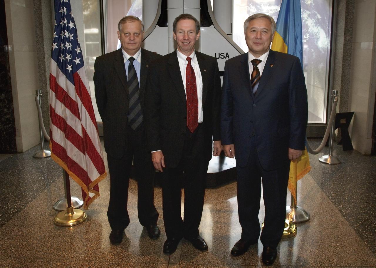 Director General of the National Space Agency of Ukraine Yuriy Sergiyovych Alekseyev, left, NASA Administrator Michael Griffin, center, and Prime Minister of Ukraine Yuriy Yekhanurov pose for a photograph prior to their meeting at NASA Headquarters, Tuesday, Nov. 1, 2005, in Washington. Photo Credit: (NASA/Bill Ingalls)