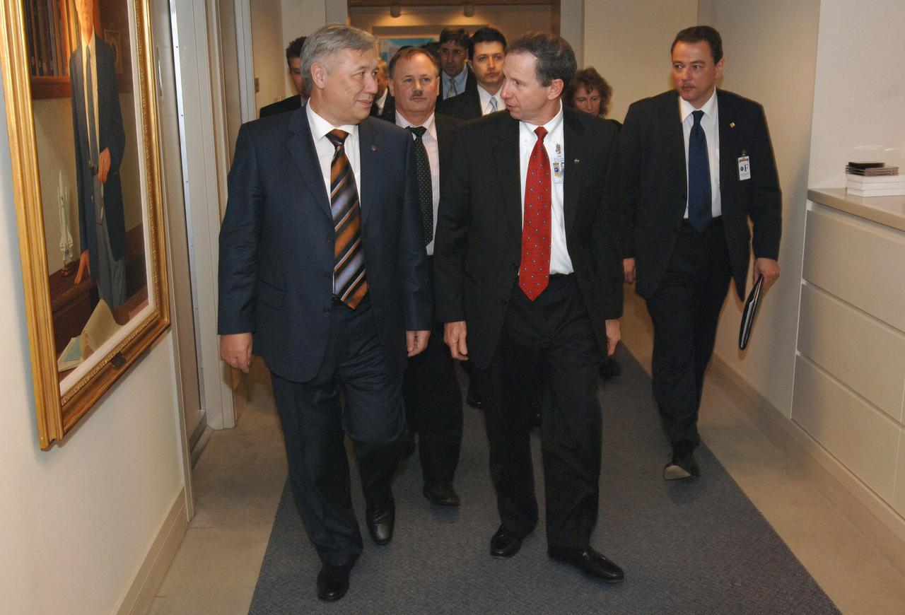 Yuriy Yekhanurov, Prime Minister of Ukraine, left, and NASA Administrator Michael Griffin, walk together prior to the start of a meeting Tuesday, Nov. 1, 2005, at NASA Headquarters in Washington. Photo Credit: (NASA/Bill Ingalls)
