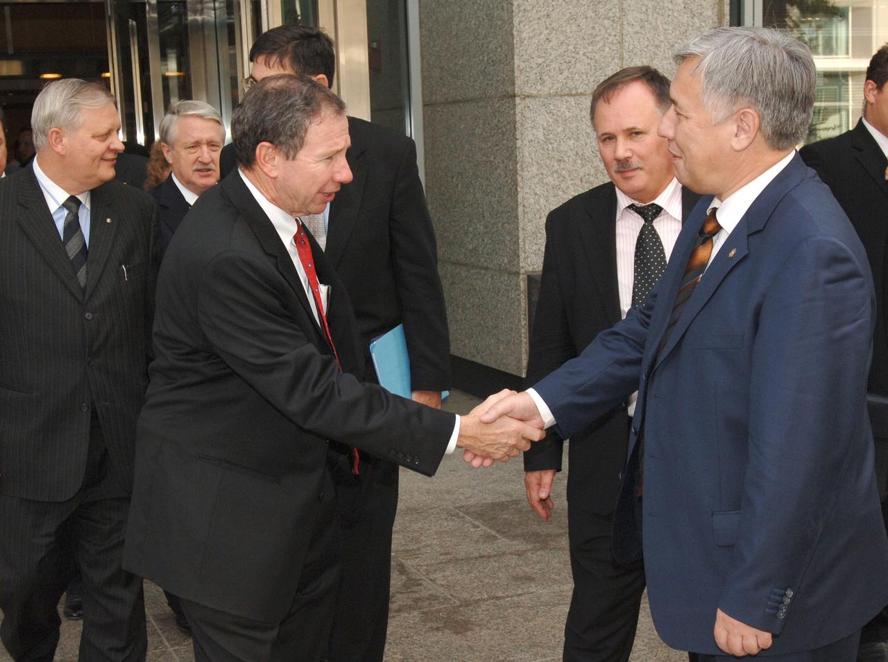 NASA Administrator Michael Griffin, left, shakes hands with Yuriy Yekhanurov, Prime Minister of Ukraine after a visit to NASA Headquarters on Tuesday, Nov. 1, 2005 in Washington. Photo Credit: (NASA/Bill Ingalls)