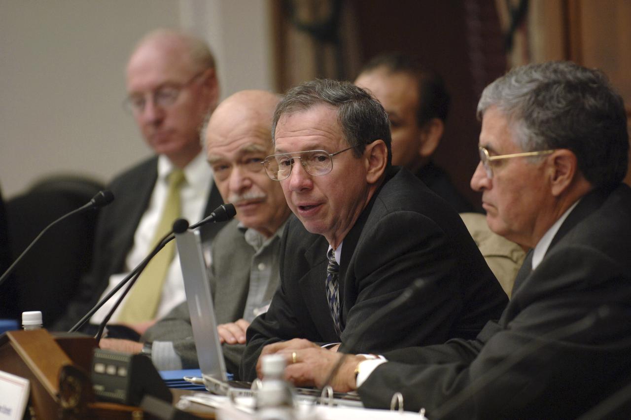 NASA Administrator Michael Griffin, second from right, talks with NASA Advisory Council members at the Rayburn House Office Building, Tuesday, Nov. 29, 2005, in Washington.  Photo Credit: (NASA/Bill Ingalls)
