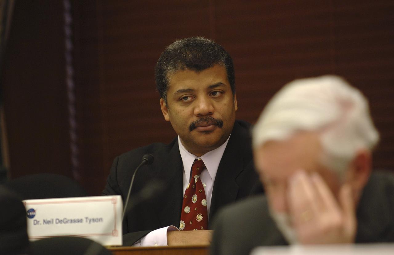 Dr. Neil DeGrasse Tyson, NASA Advisory Council member listens during a meeting of the council at the Rayburn House Office Building, Tuesday, Nov. 29, 2005, in Washington. Photo Credit: (NASA/Bill Ingalls)