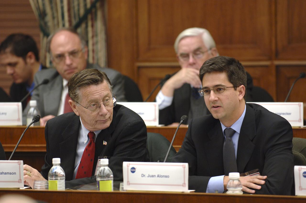 Dr. Juan J. Alonso, right, talks during the NASA Advisory Council meeting held at the Rayburn House Office Building, Tuesday, Nov. 29, 2005, in Washington.  Photo Credit: (NASA/Bill Ingalls) 