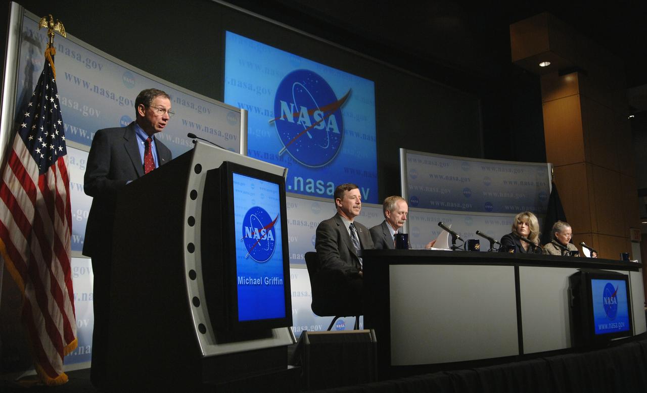 NASA Administrator Michael Griffin outlines the President's budget for fiscal year 2007 during a news conference, Monday, Feb. 6, 2006, at NASA Headquarters in Washington. Griffin was joined by the heads of NASA's four mission directorates to explain how the proposed $16.8 billion dollar budget supports the Vision for Space Exploration. Seated left to right: Scott Horowitz, NASA Associate Administrator for Exploration Systems, William Gerstenmaier, NASA Associate Administrator for Space Operations, Lisa Porter, NASA Associate Administrator for Aeronautics Research and Mary Cleave, NASA Associate Administrator for Science. Photo Credit: (NASA/Bill Ingalls)