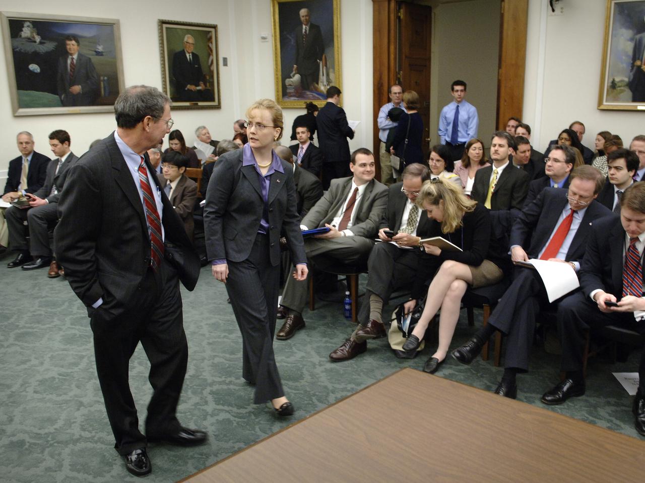 NASA Administrator Michael Griffin, left, and NASA Deputy Administrator Shana Dale talk prior to the start of a hearing before the House Science & Technology Committee regarding NASA's FY 2007 budget request, Thursday, Feb., 16, 2006, in Washington. Photo Credit: (NASA/Bill Ingalls)