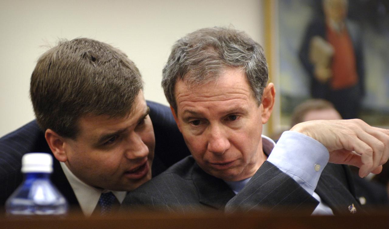 NASA Administrator Michael Griffin, right, and Brian Chase, NASA's Assistant Administrator for Legislative Affairs confer prior to the start of a hearing before the House Science & Technology Committee regarding NASA's FY 2007 budget request, Thursday, Feb., 16, 2006, in Washington. Photo Credit: (NASA/Bill Ingalls)